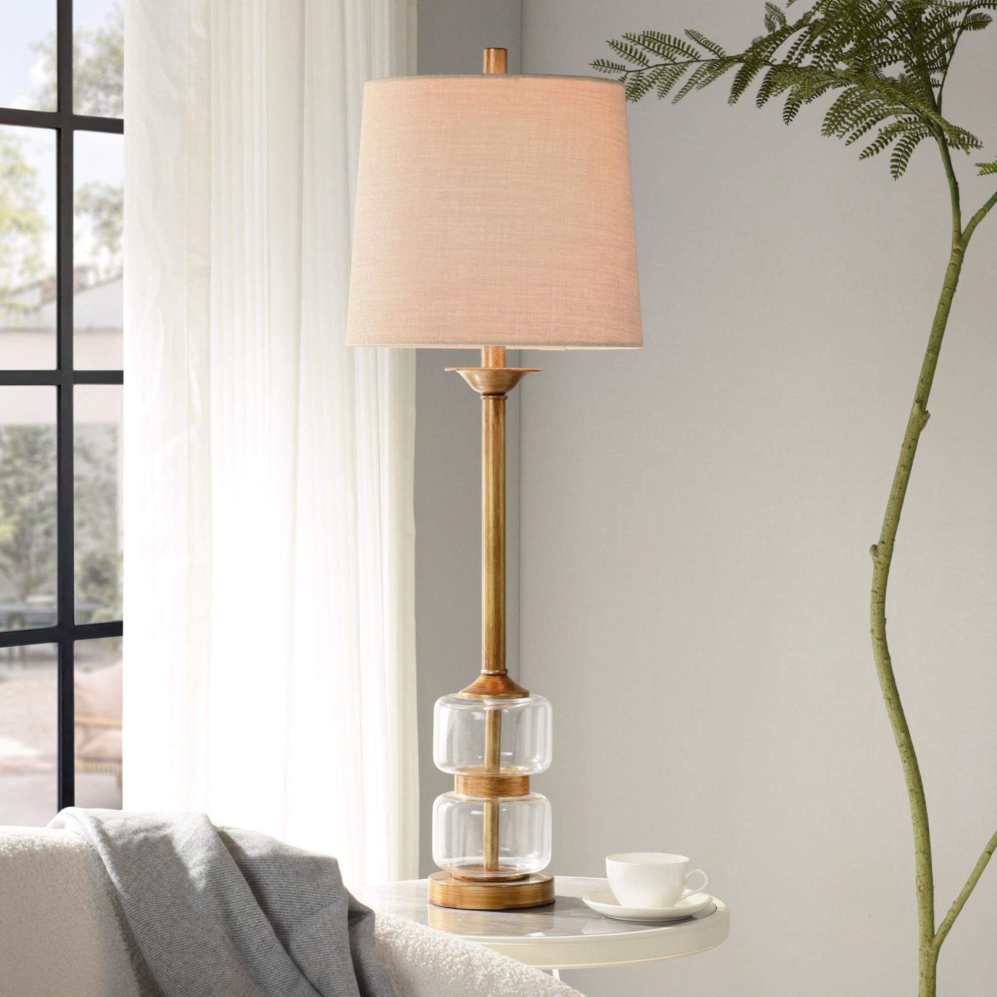 Shown in Clear And Gold finish and Beige Hardback Fabric shade