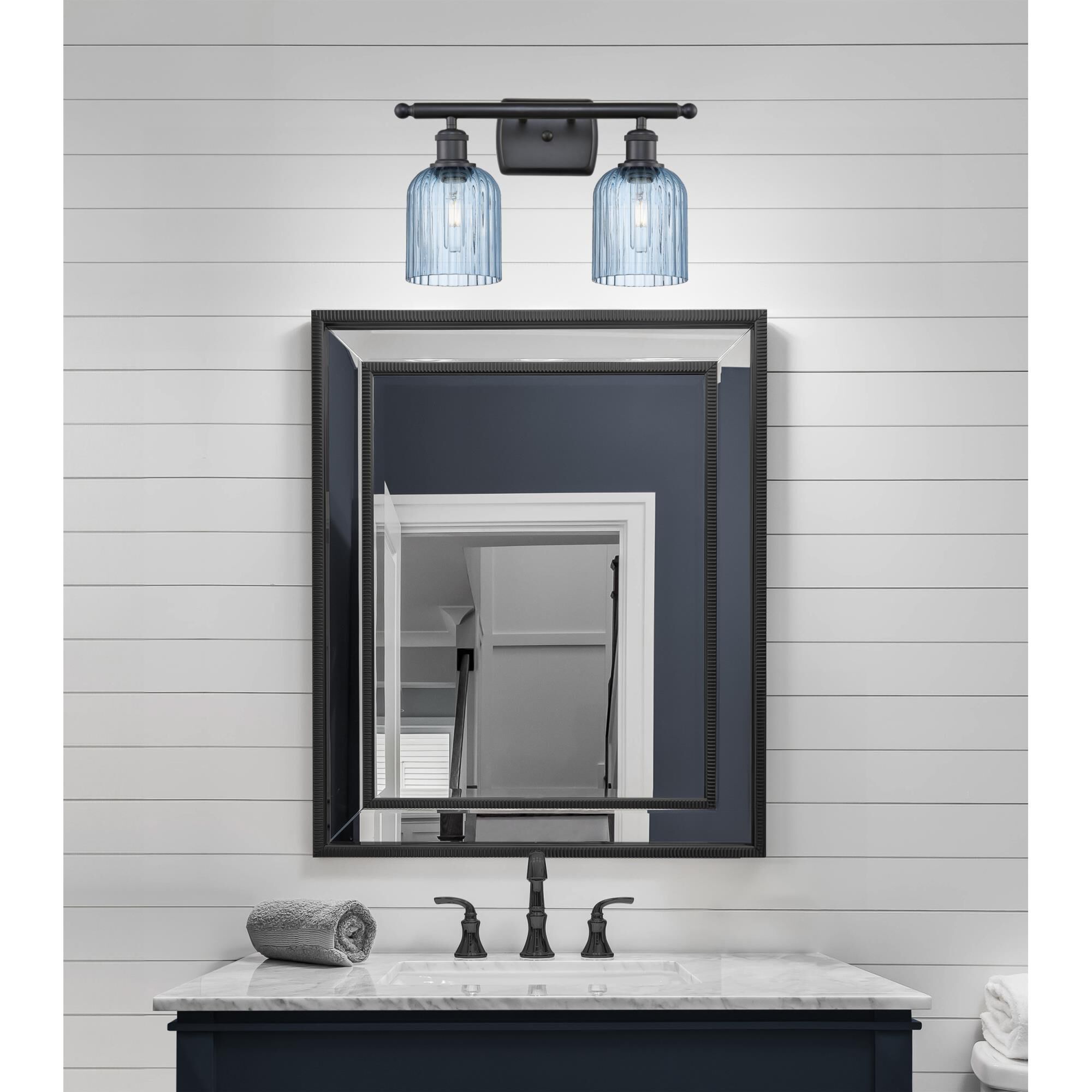 Shown in Matte Black finish and Princess Blue glass