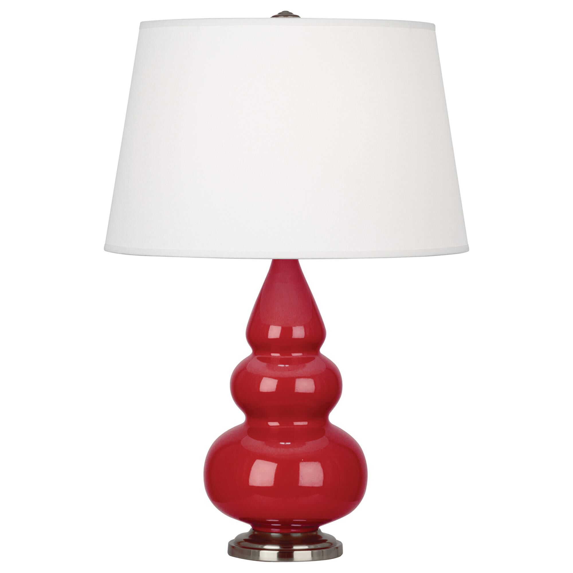 Shown in Ruby Red Glazed Ceramic With Antique Silver ed Accents finish and Pearl Dupioni Fabric shade