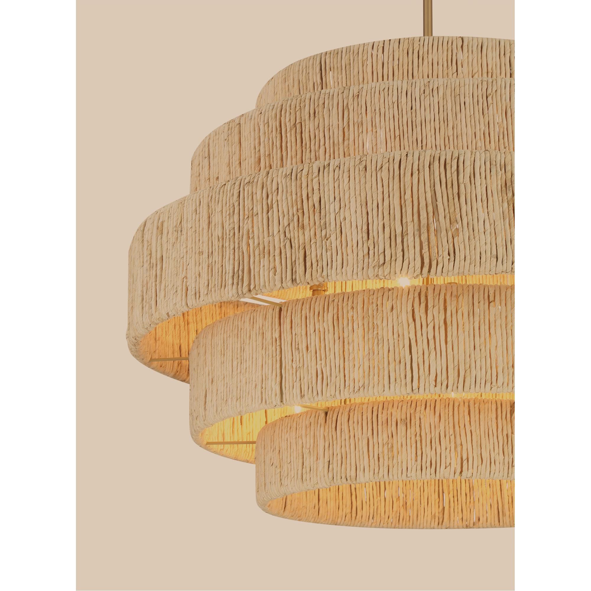 Shown in Signature Brass finish and Natural Abaca shade