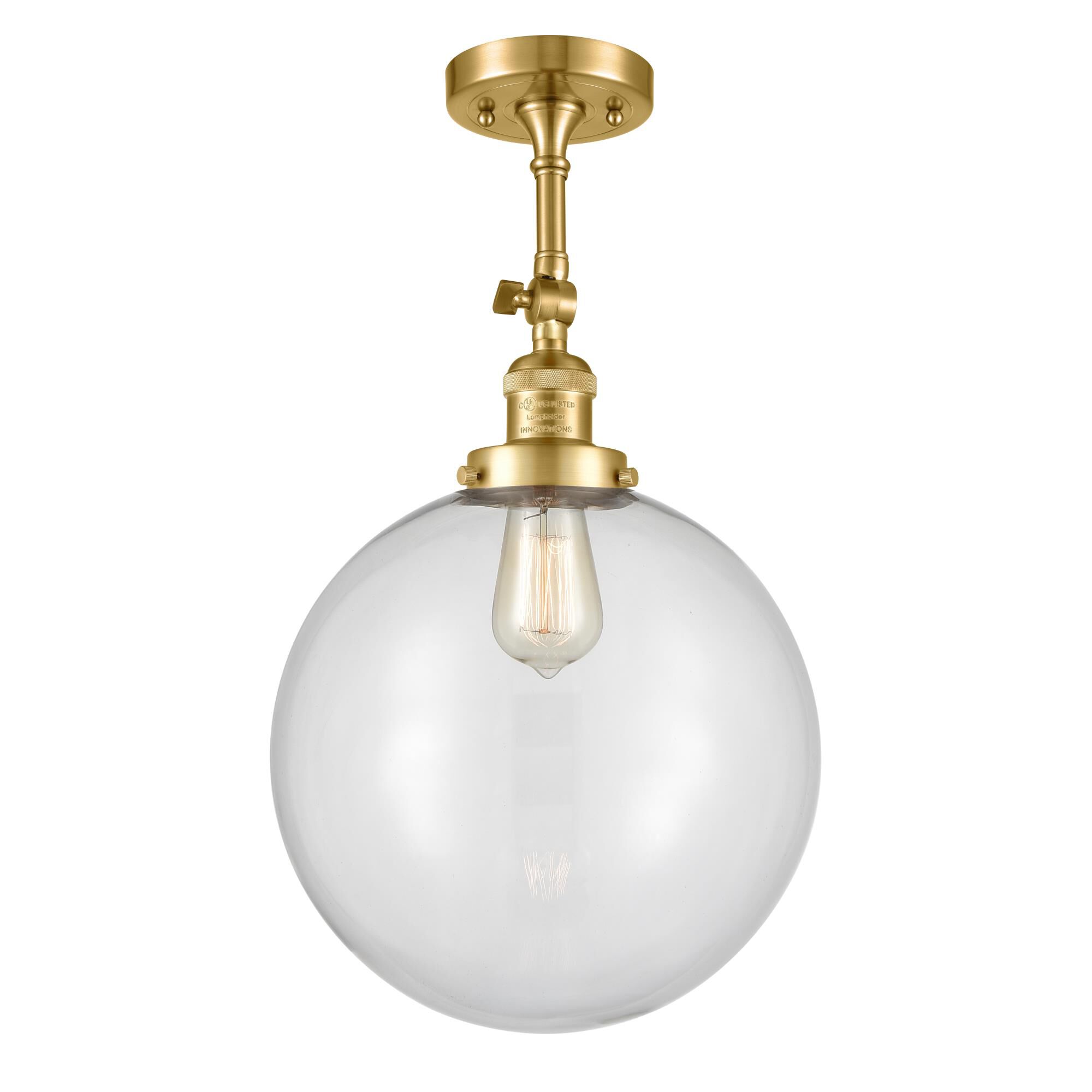 Shown in Satin Gold finish and Clear Beacon glass