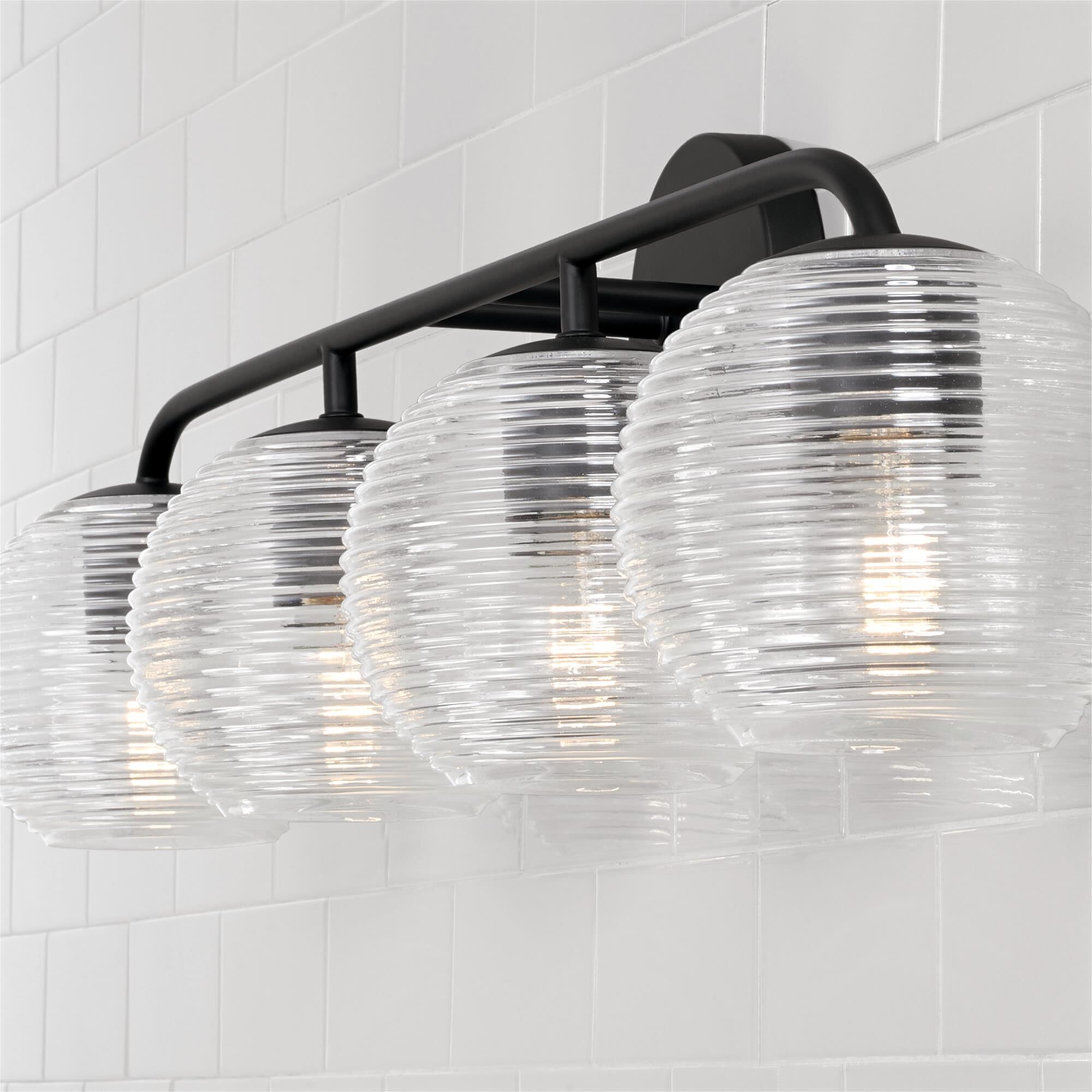 Shown in Matte Black finish and Clear Ribbed glass