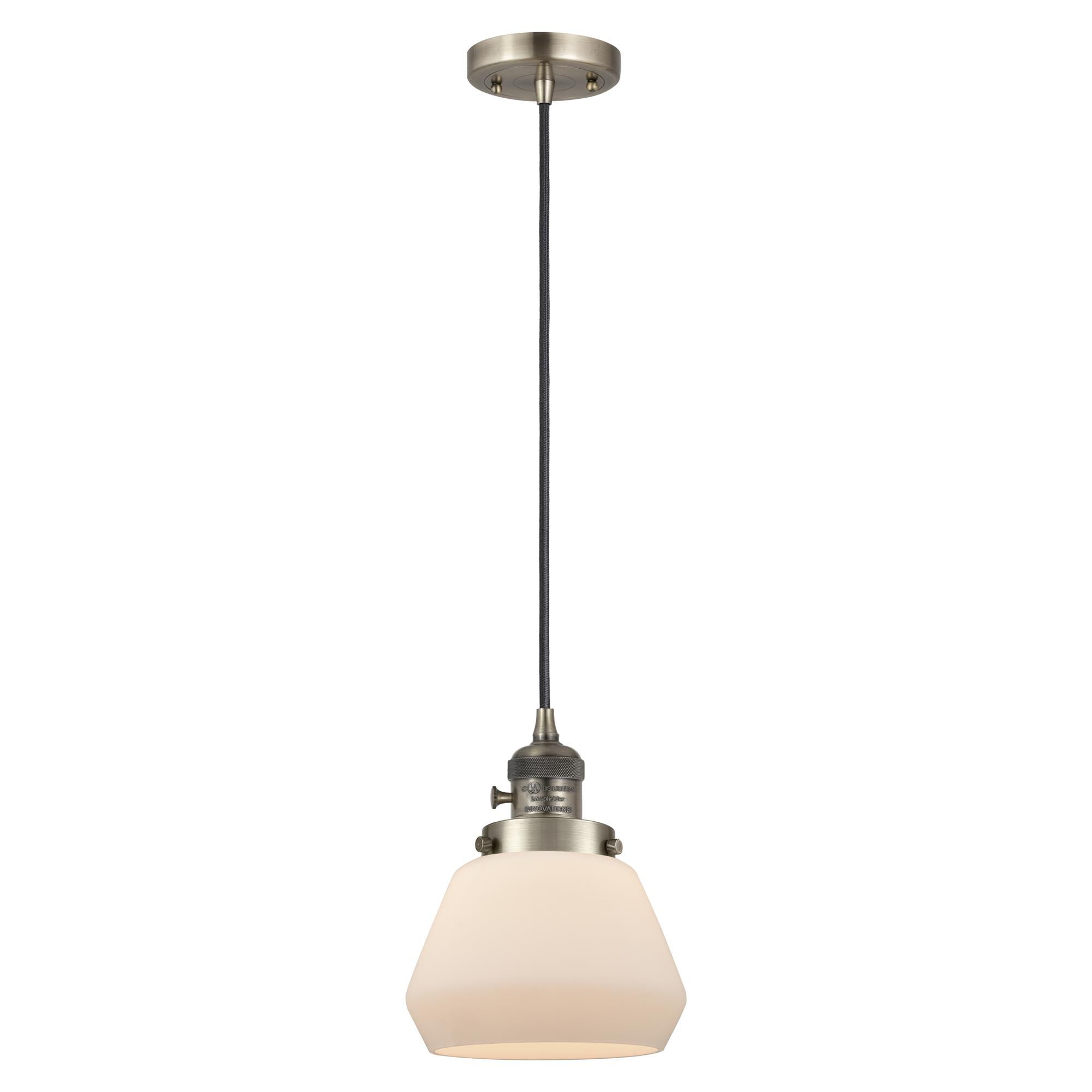 Shown in Antique Brass finish and Matte White glass