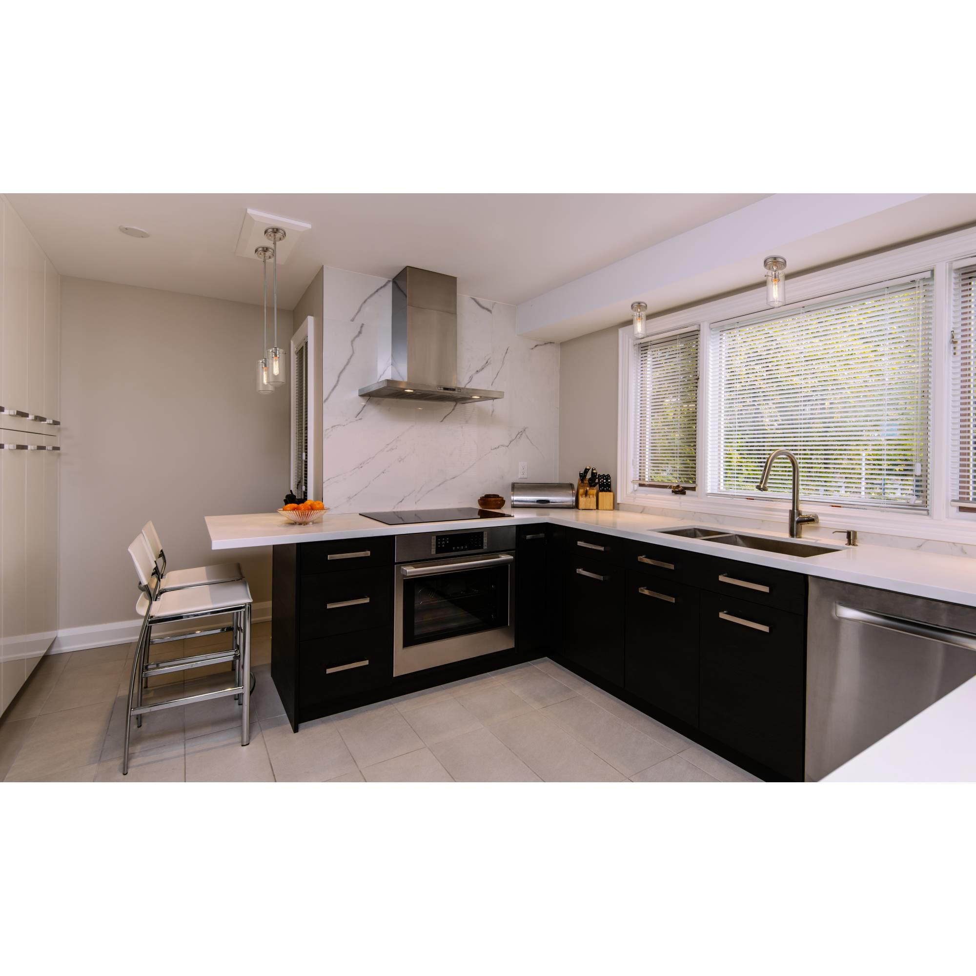 Shown in Brushed Nickel finish and Glass shade