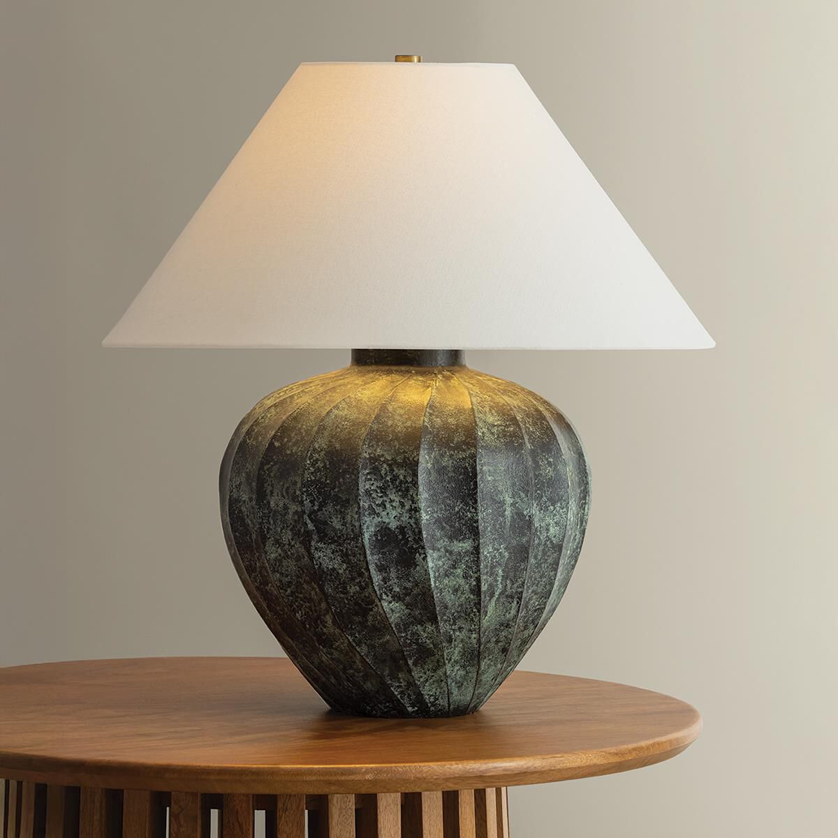 Shown in Patina Brass finish and Off White Linen shade