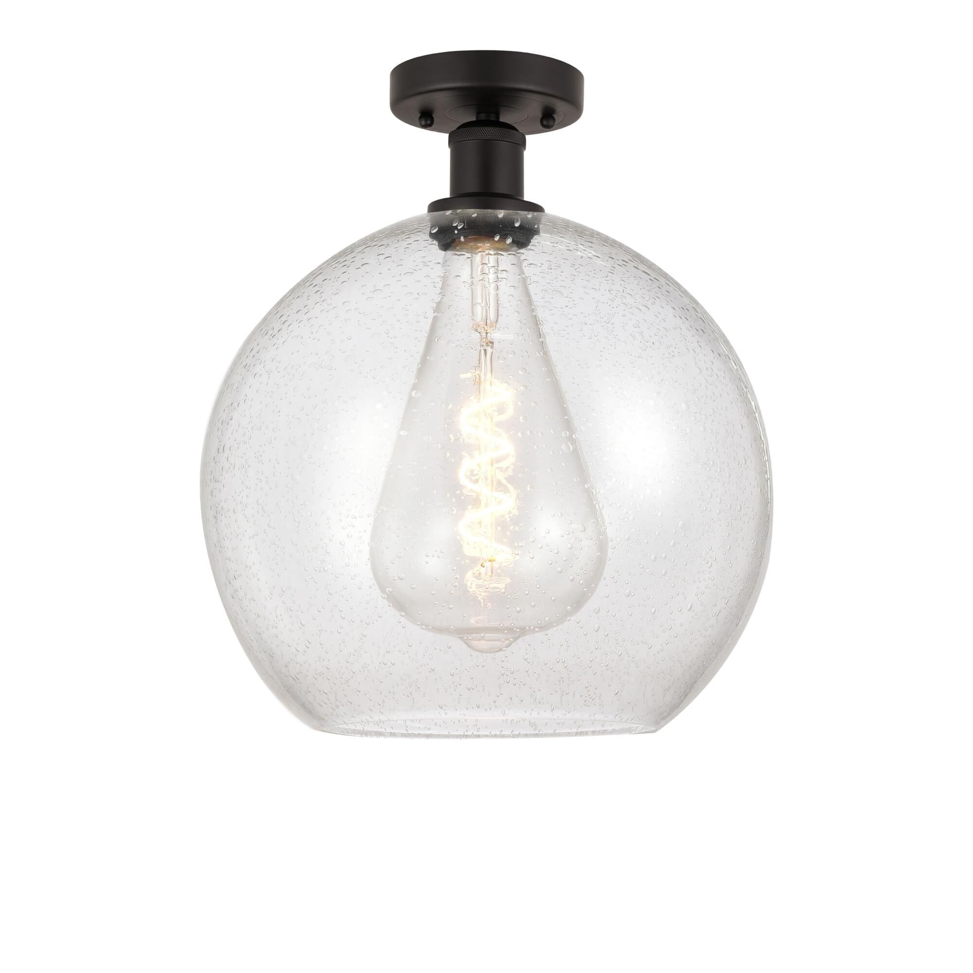 Shown in Oil Rubbed Bronze finish and Seedy glass