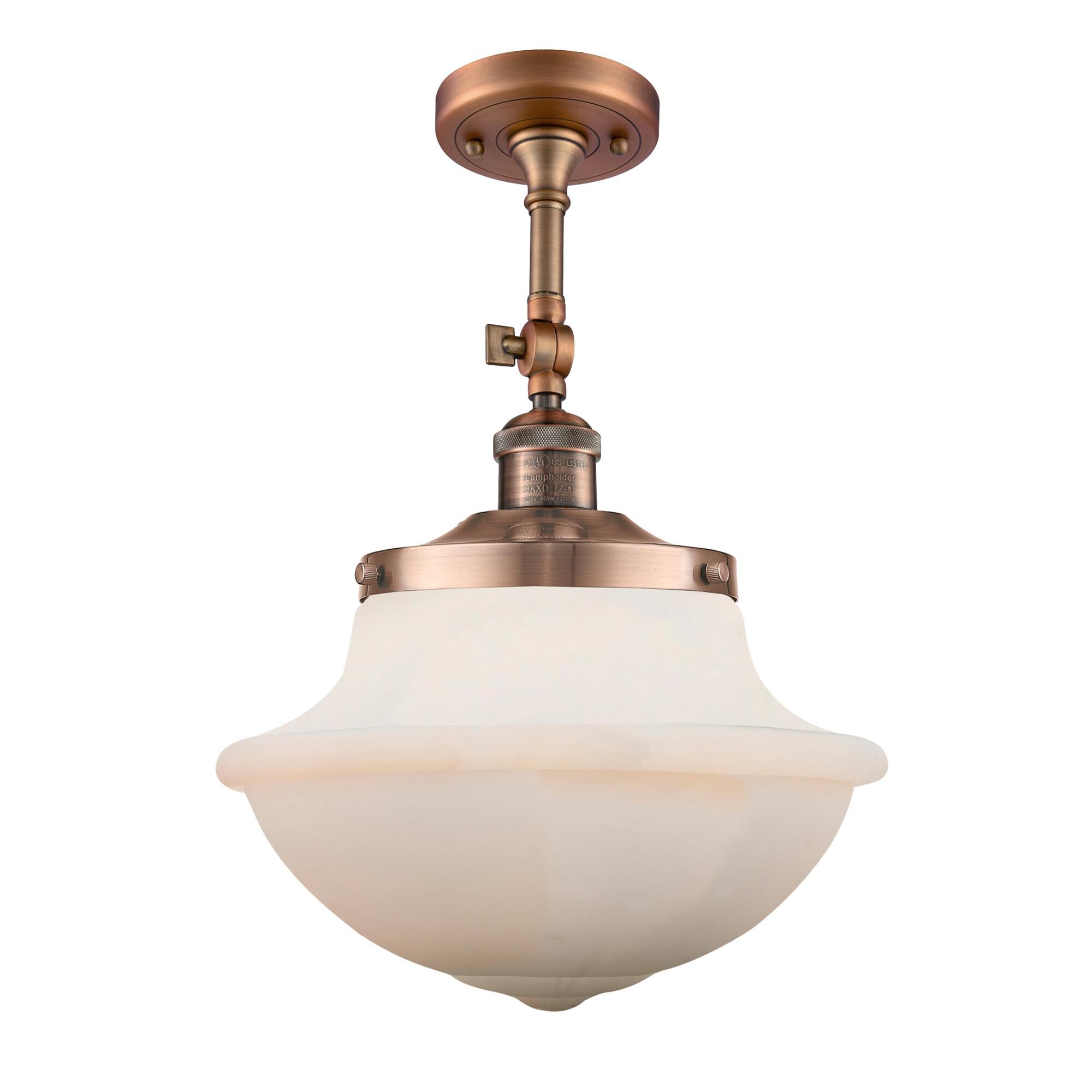 Shown in Antique Copper finish and Matte White glass