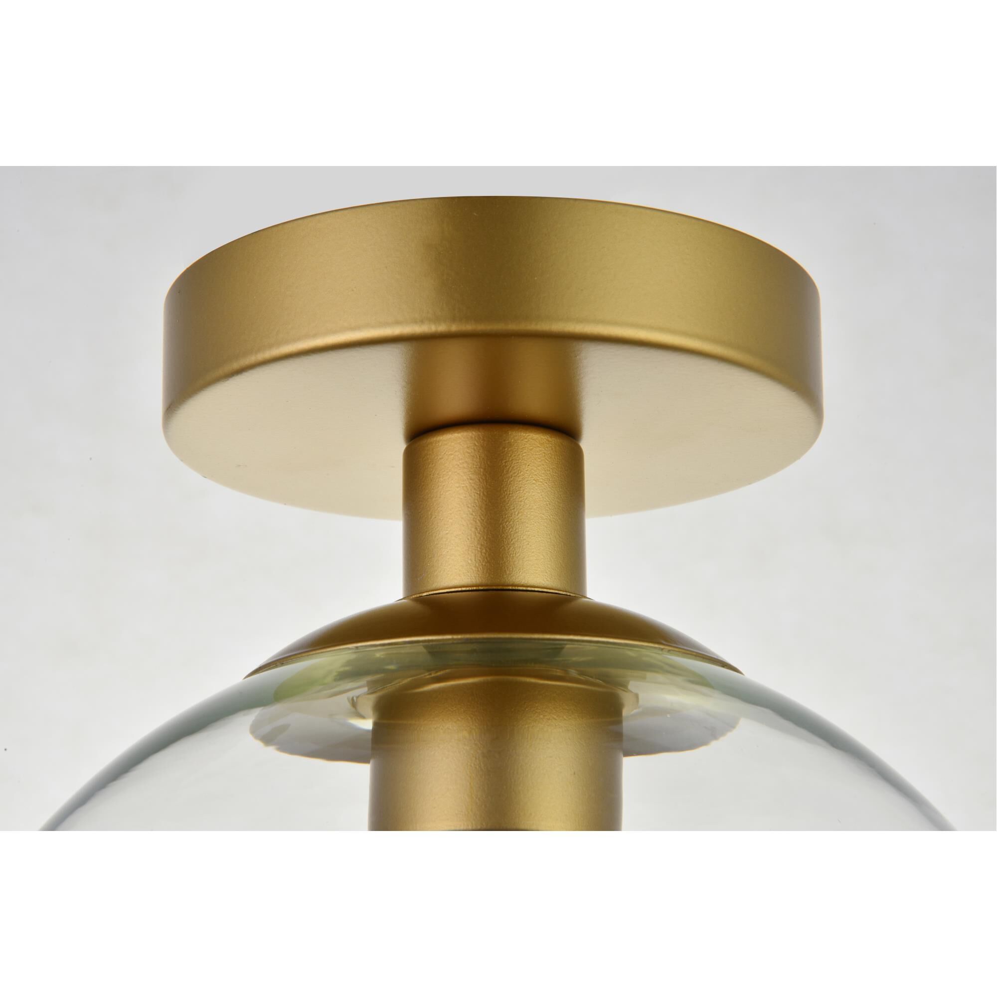 Shown in Brass finish and Clear glass