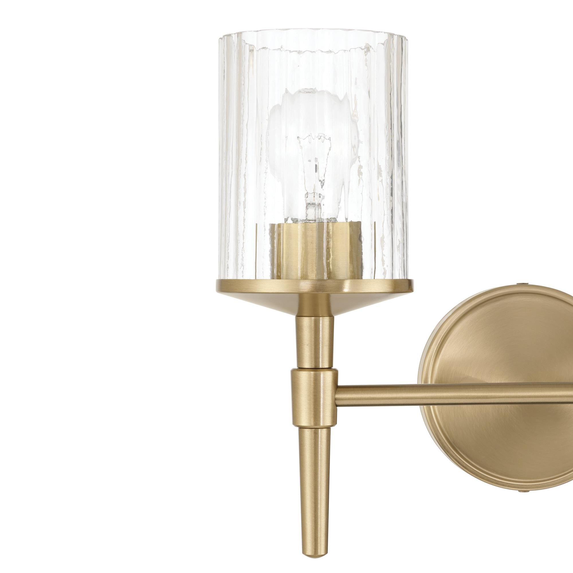 Shown in Champagne Gold finish and Clear Ribbed glass