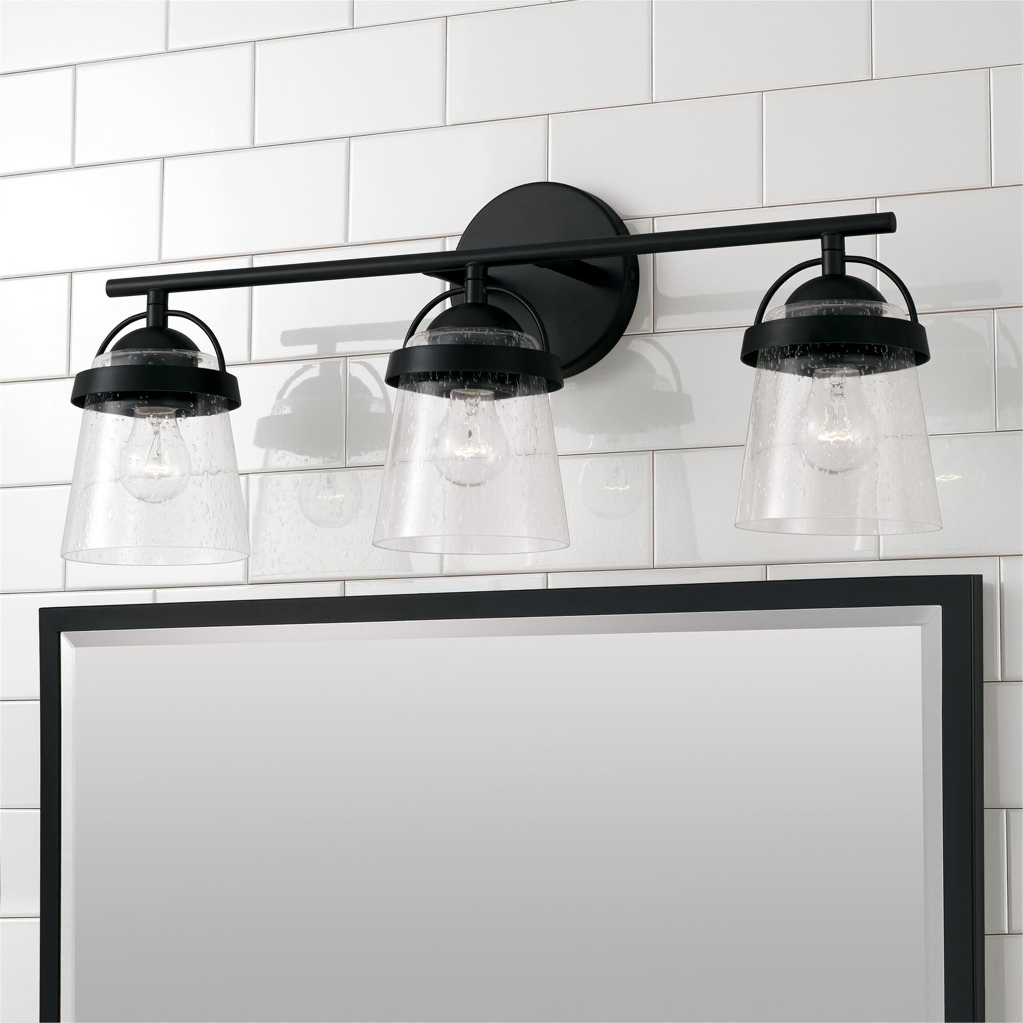Shown in Matte Black finish and Clear Seeded glass