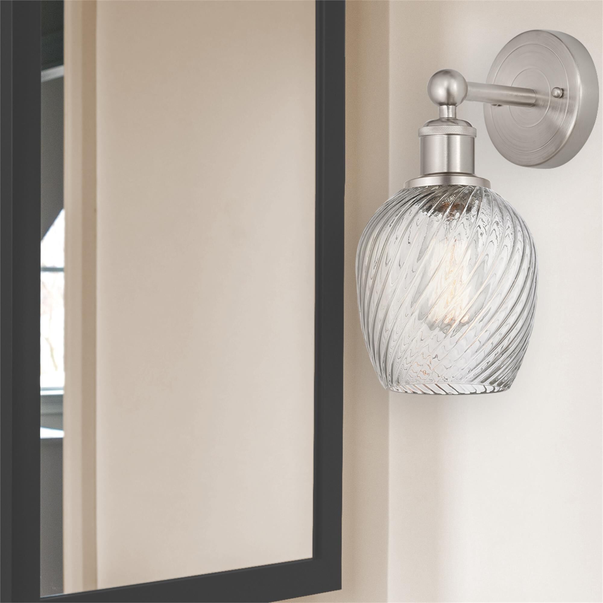 Shown in Brushed Satin Nickel  finish and Clear Spiral Fluted glass
