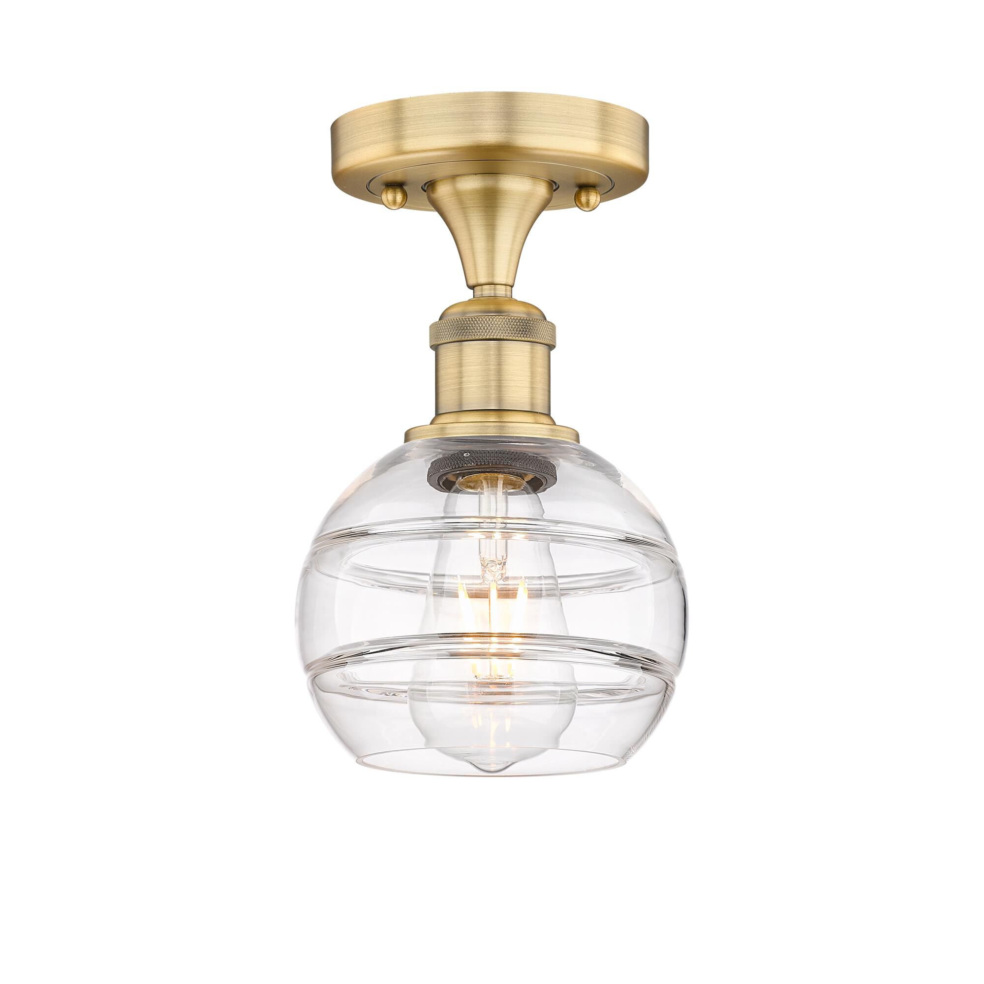 Shown in Brushed Brass finish and Clear glass