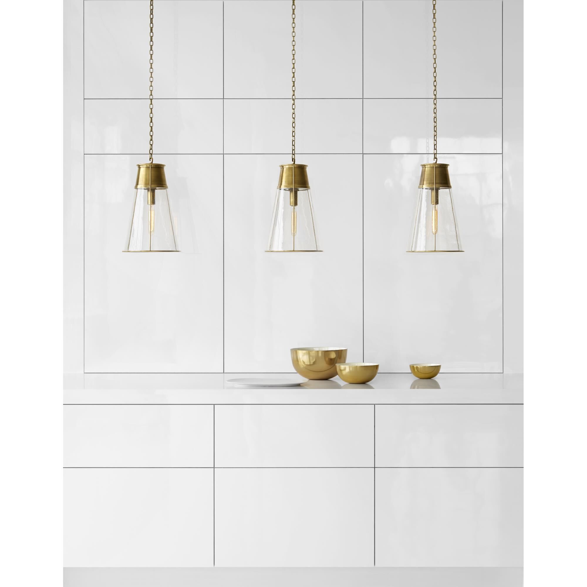 Shown in Hand-Rubbed Antique Brass finish and Seeded glass