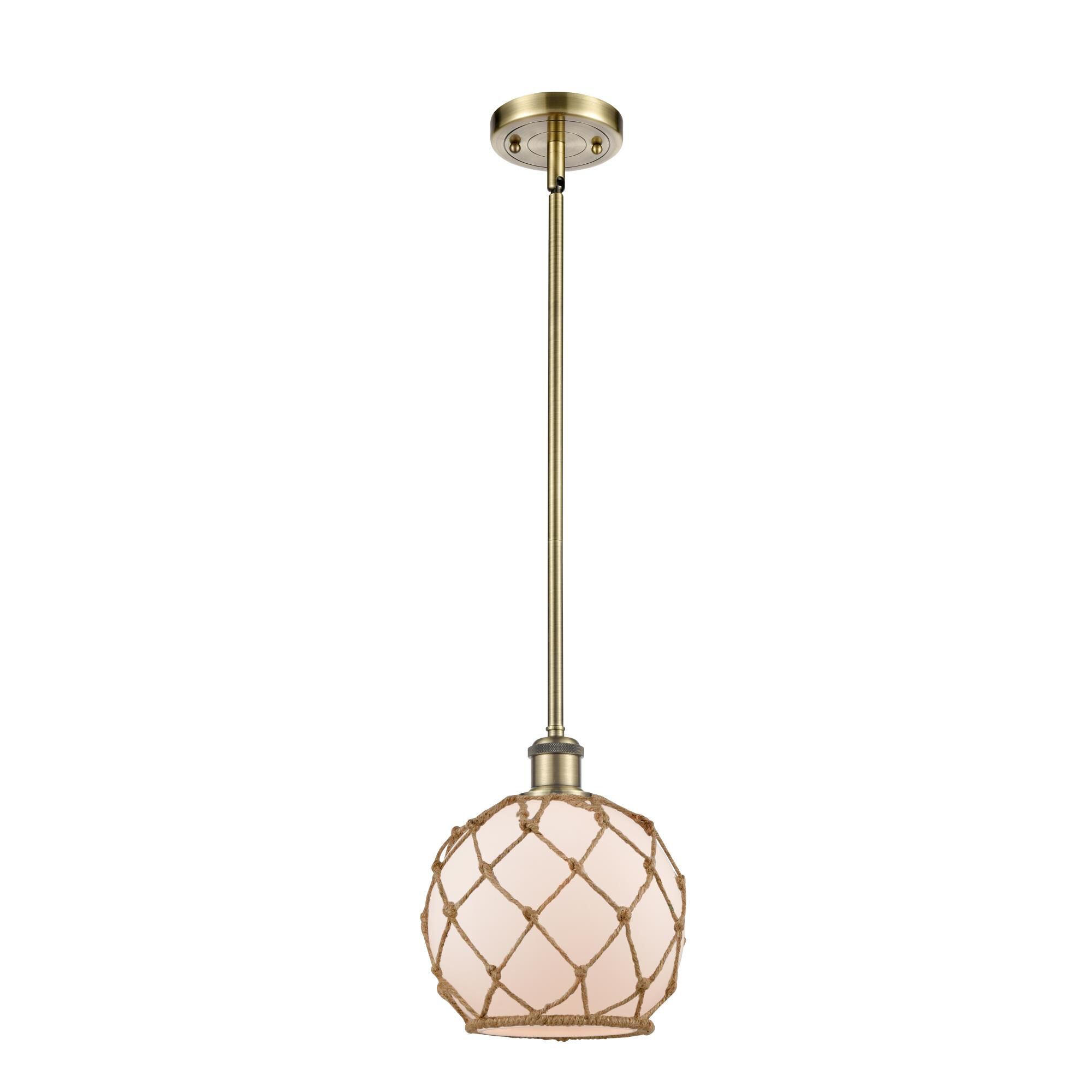 Shown in Antique Brass finish and Sphere glass and Glass And Rope shade