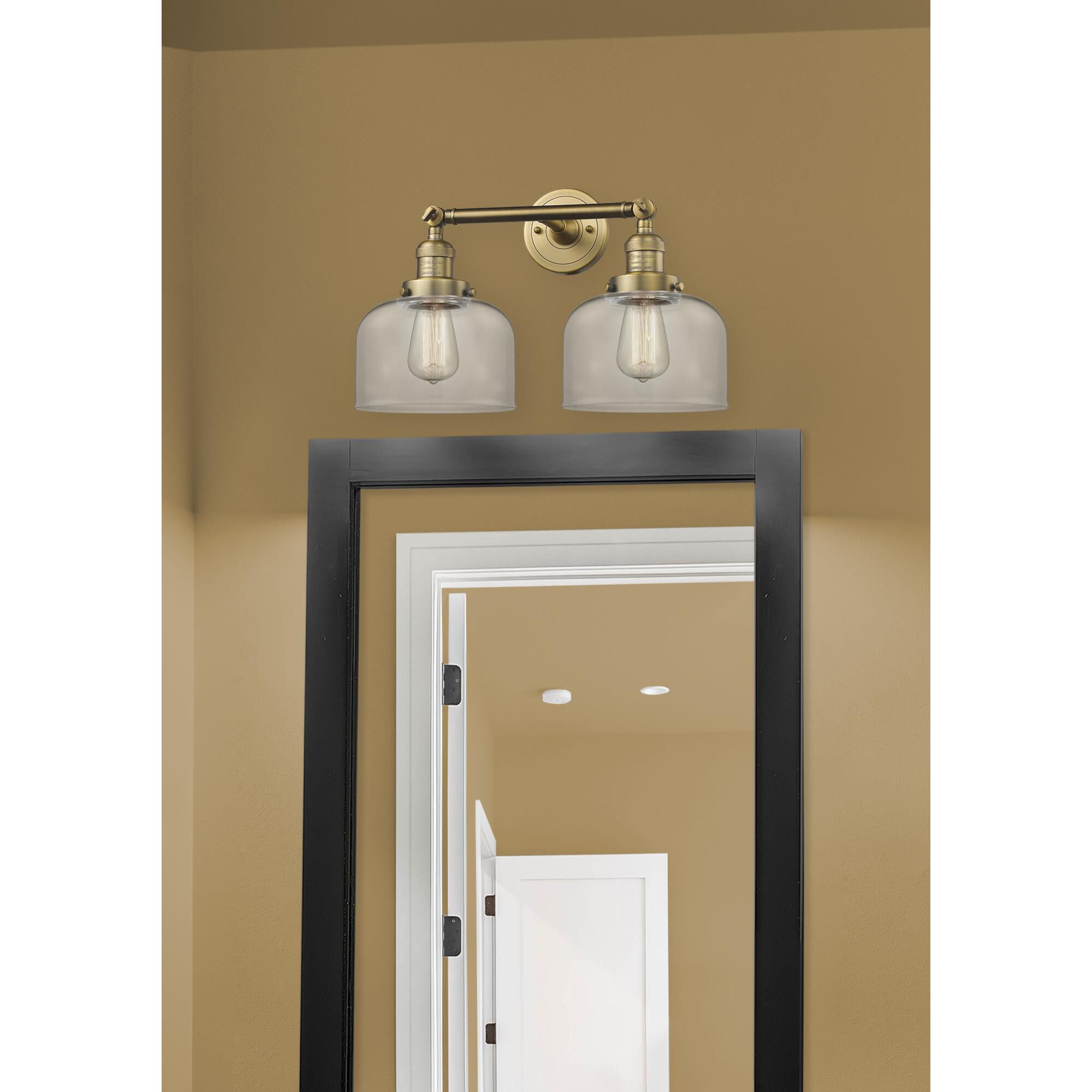 Shown in Brushed Brass finish and Clear glass