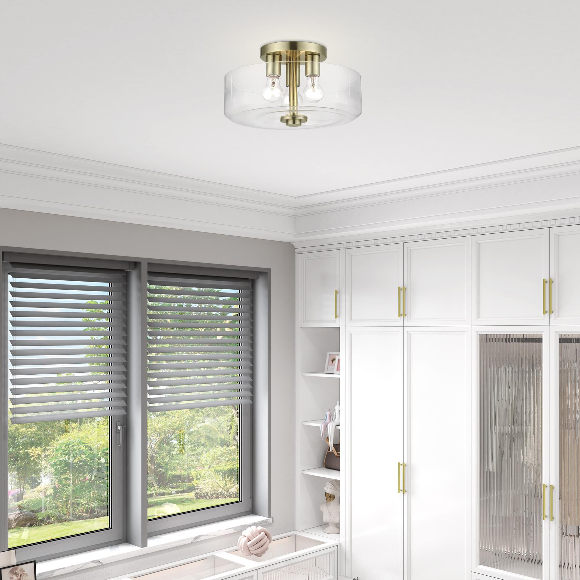 Shown in Antique Brass finish and Mouth Blown Clear glass