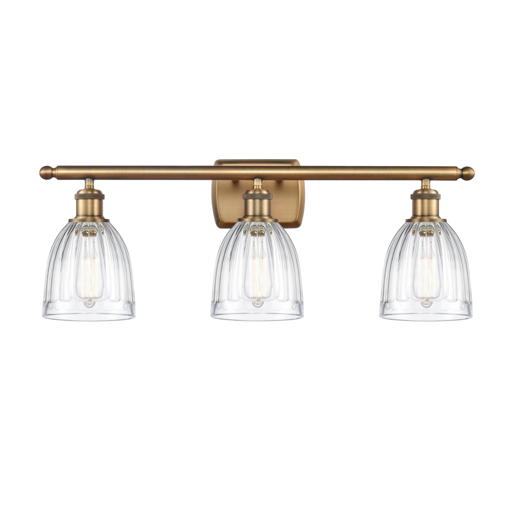 Shown in Brushed Brass finish and Drum glass and Glass shade