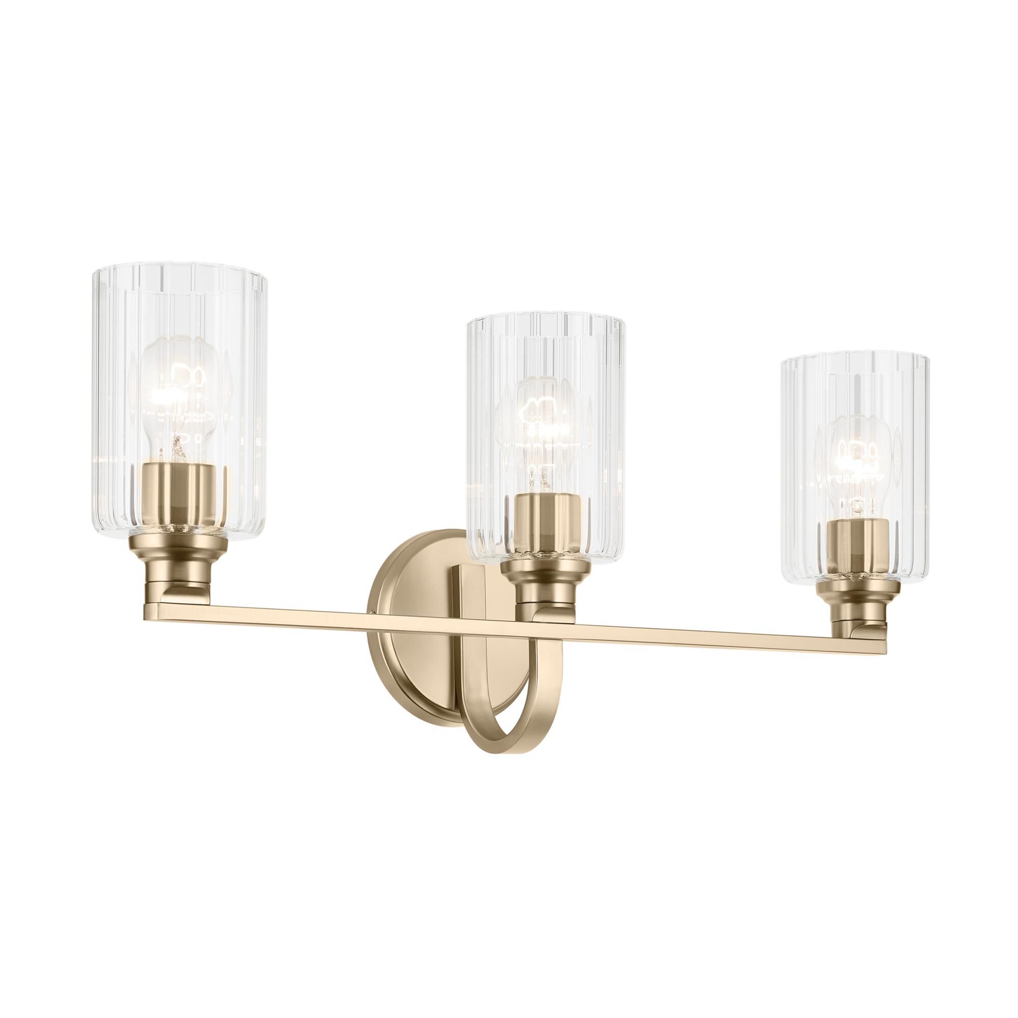 Shown in Champagne Bronze finish and Clear Fluted glass