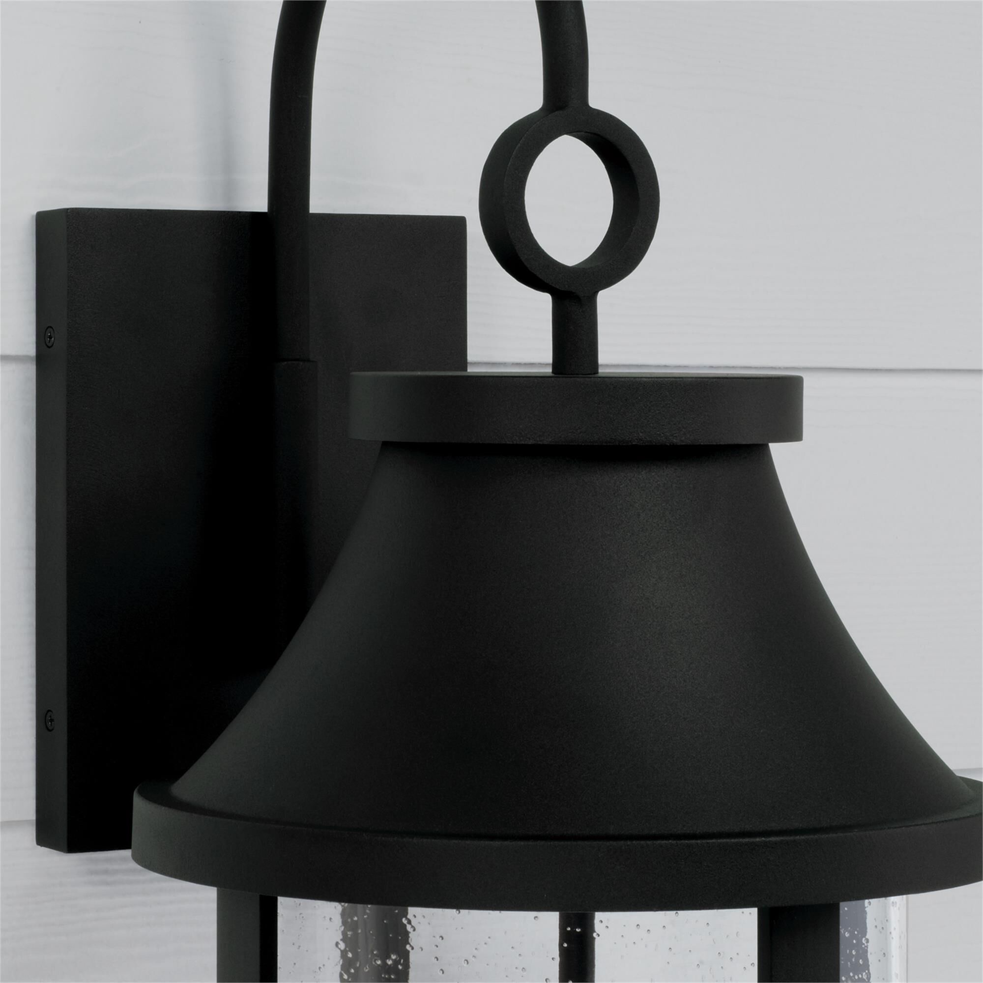 Shown in Black finish and Clear Seeded glass