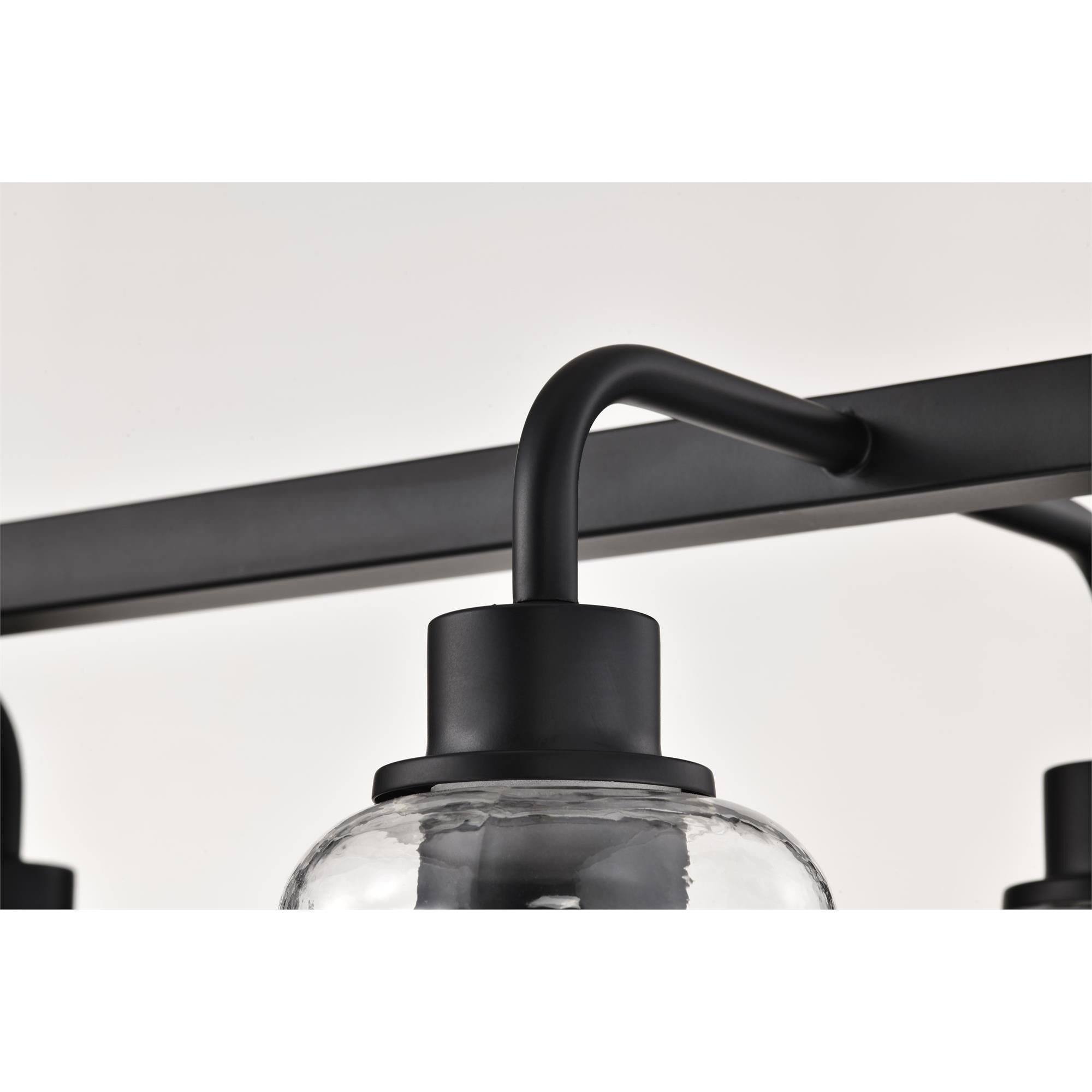 Shown in Matte Black finish and Clear Ribbed glass