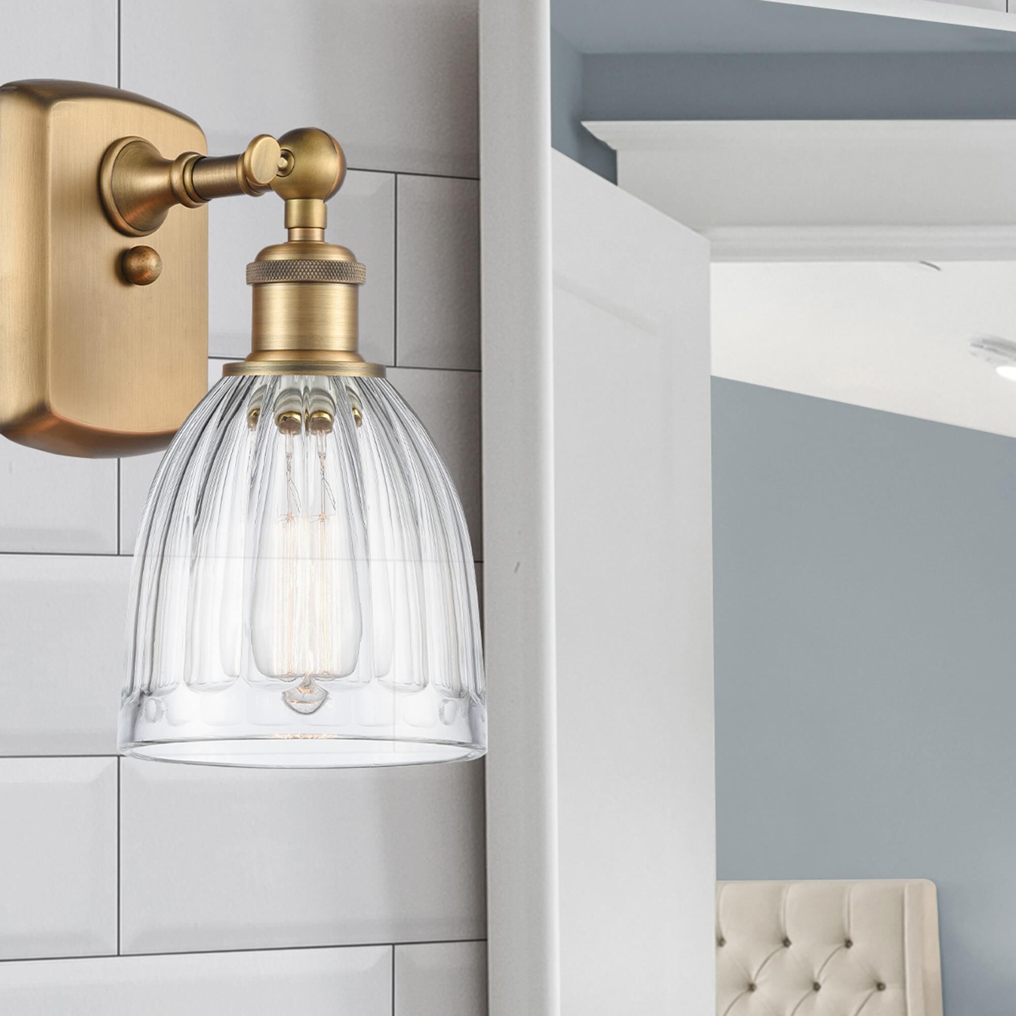 Shown in Brushed Brass finish and Drum glass and Glass shade