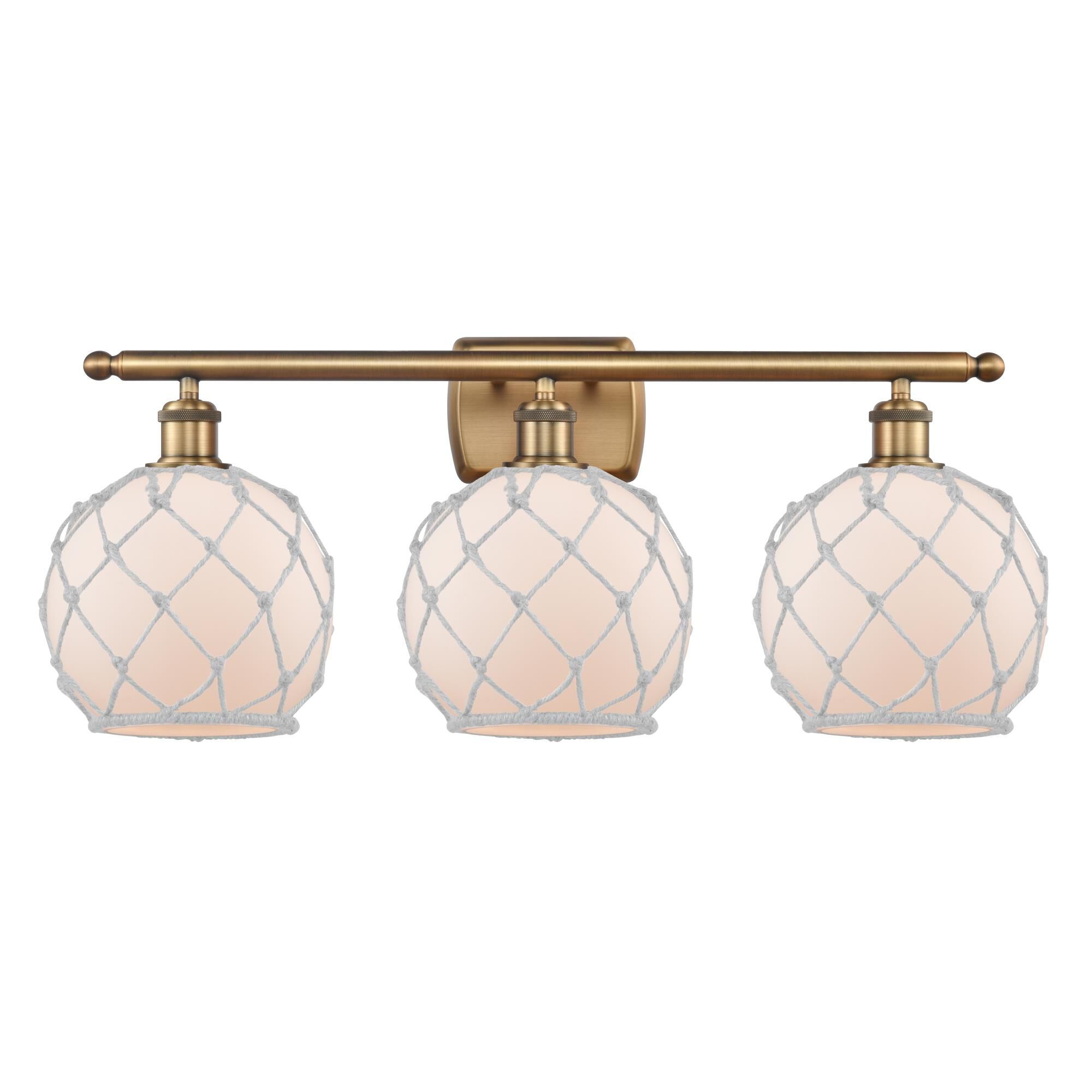 Shown in Brushed Brass finish and Sphere glass and Glass And Rope shade