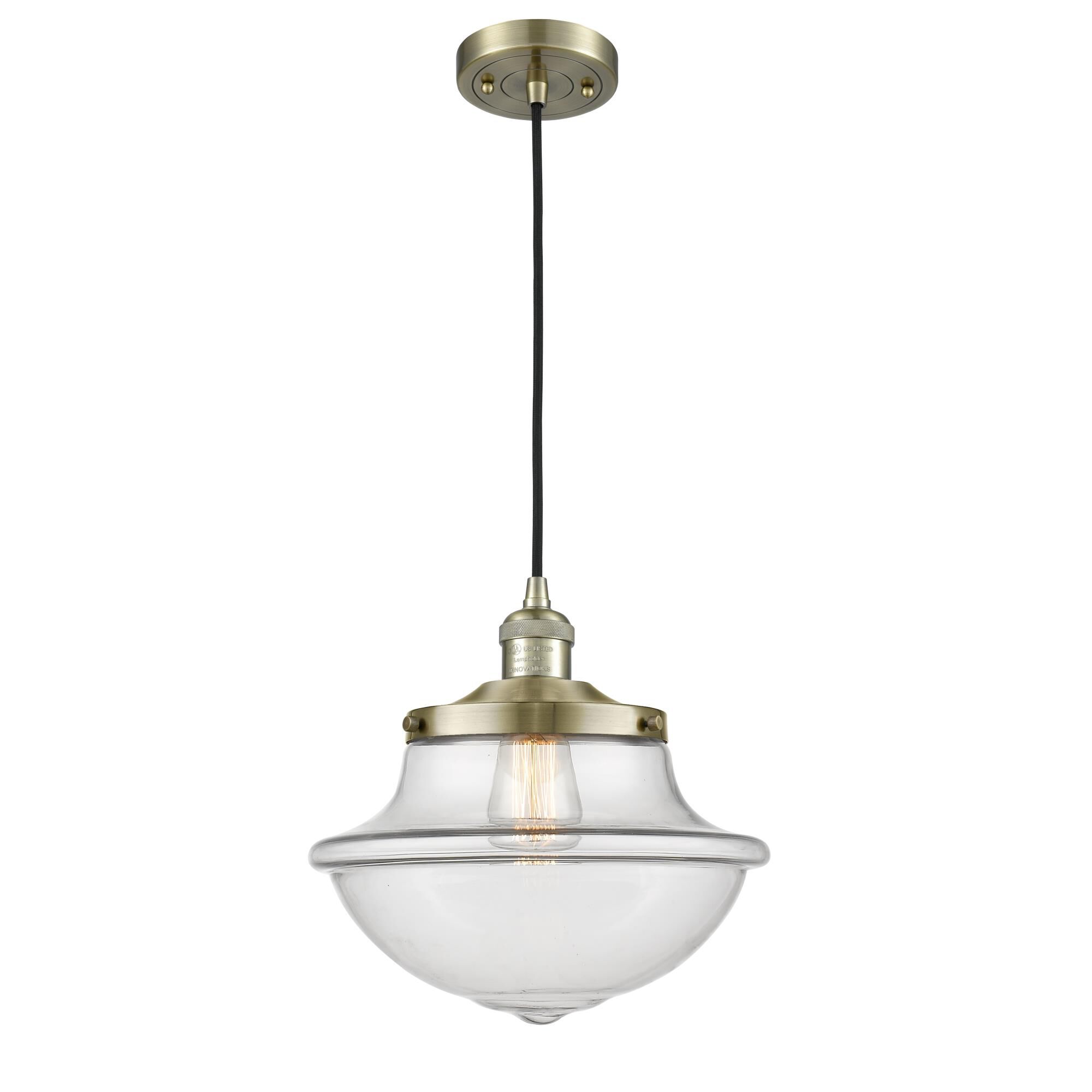 Shown in Antique Brass finish and Schoolhouse glass and Glass shade