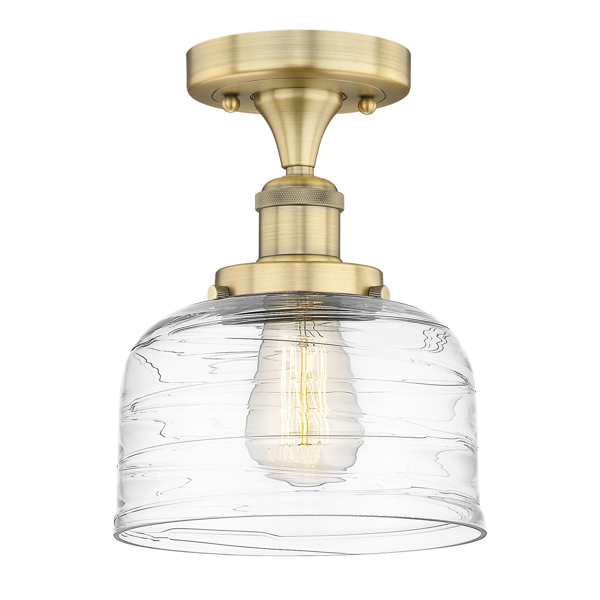 Shown in Brushed Brass finish and Clear Deco Swirl glass