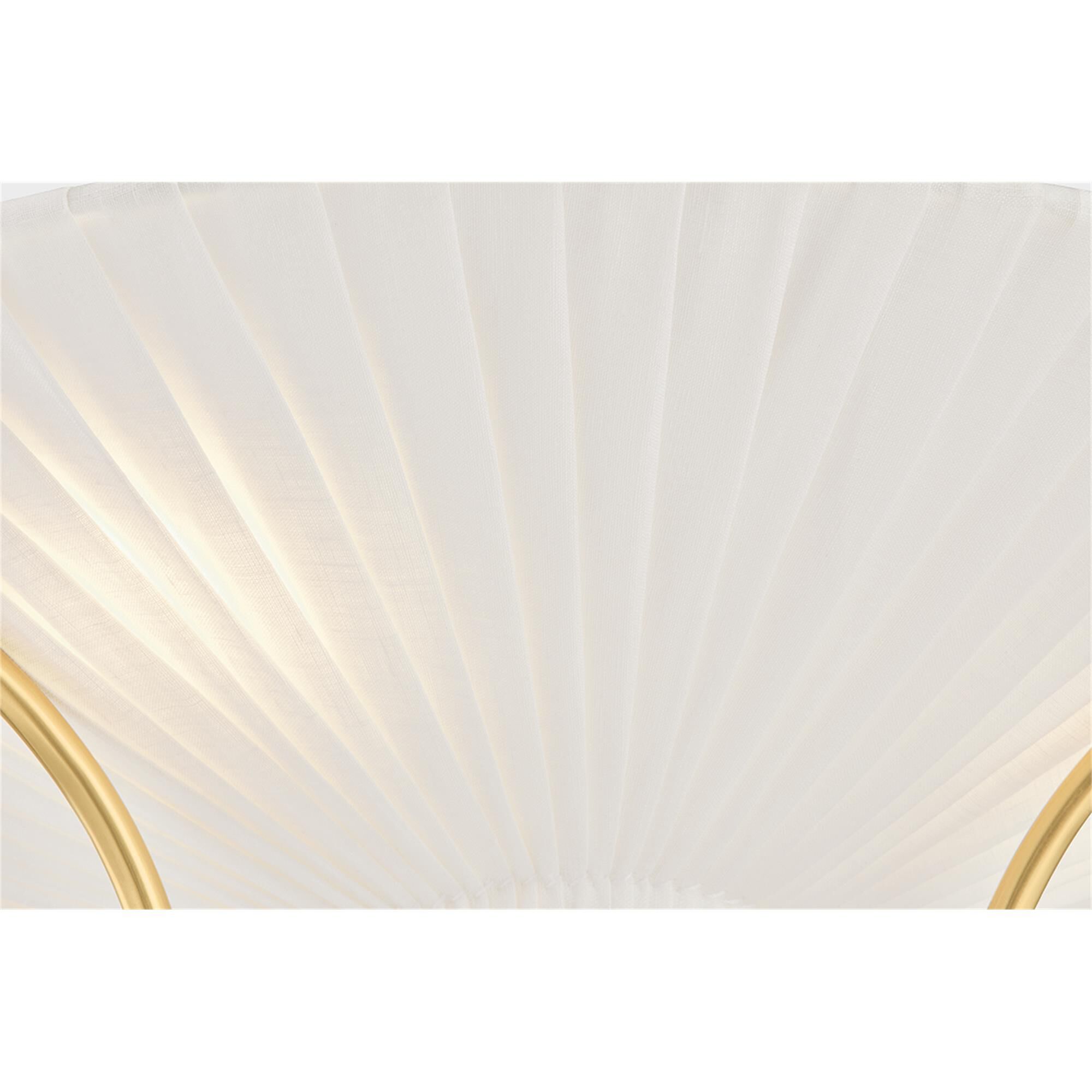 Shown in Aged Brass finish and Ivory Linen shade