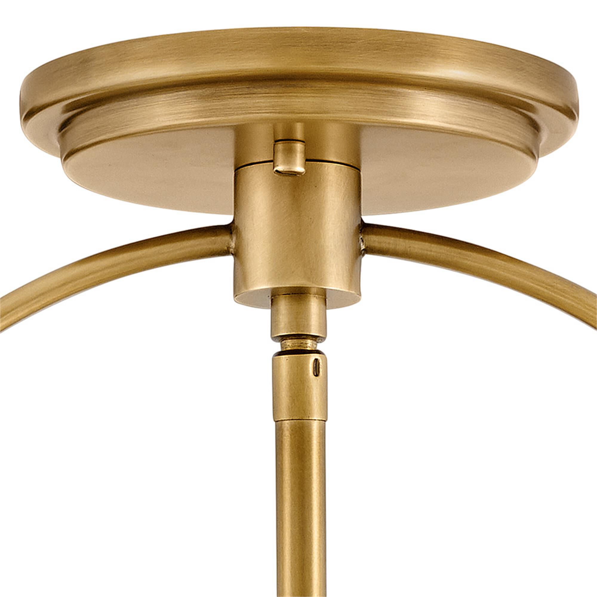 Shown in Heritage Brass with Polished White Accents finish and Clear Seedy glass