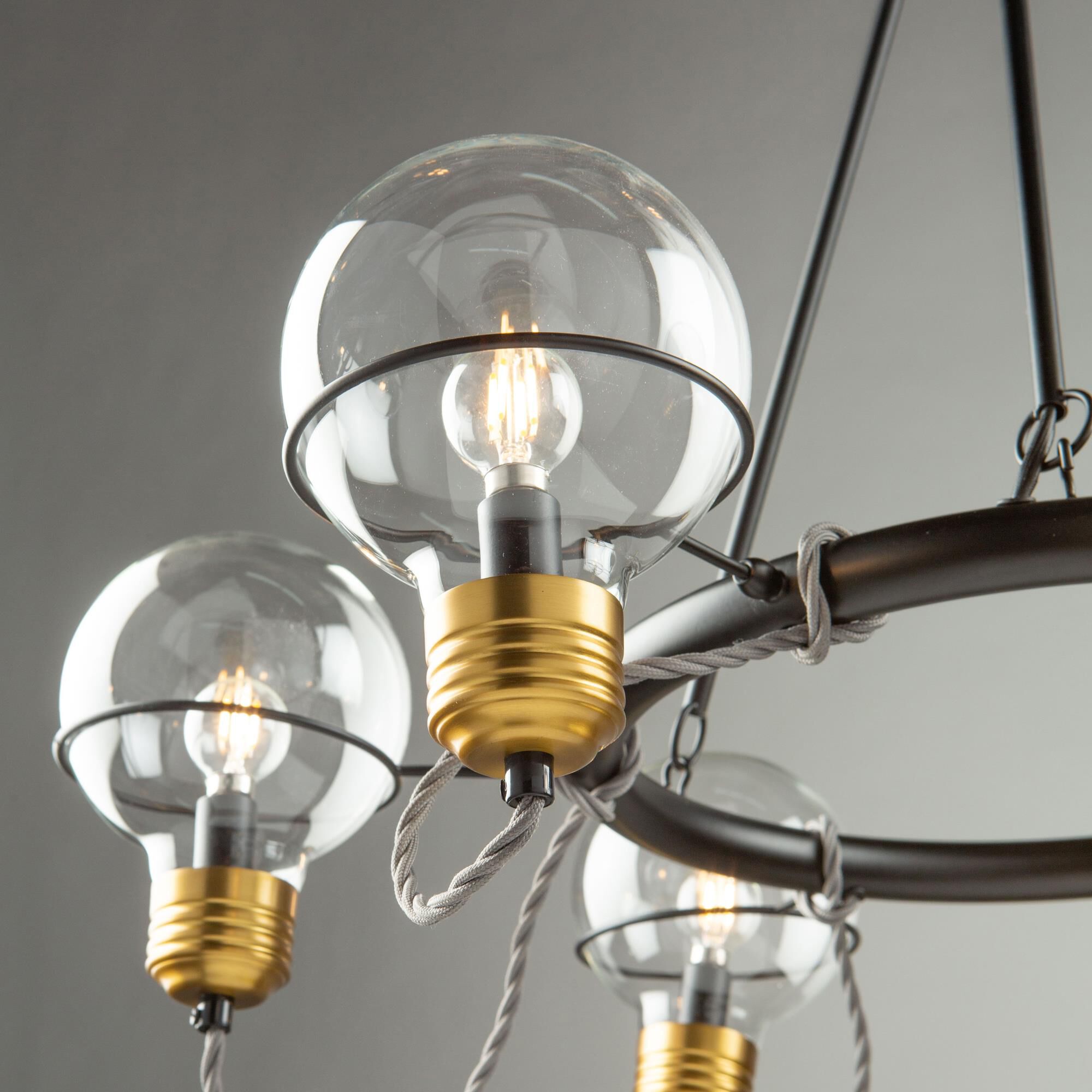 Shown in Black and Brushed Brass finish and Clear glass