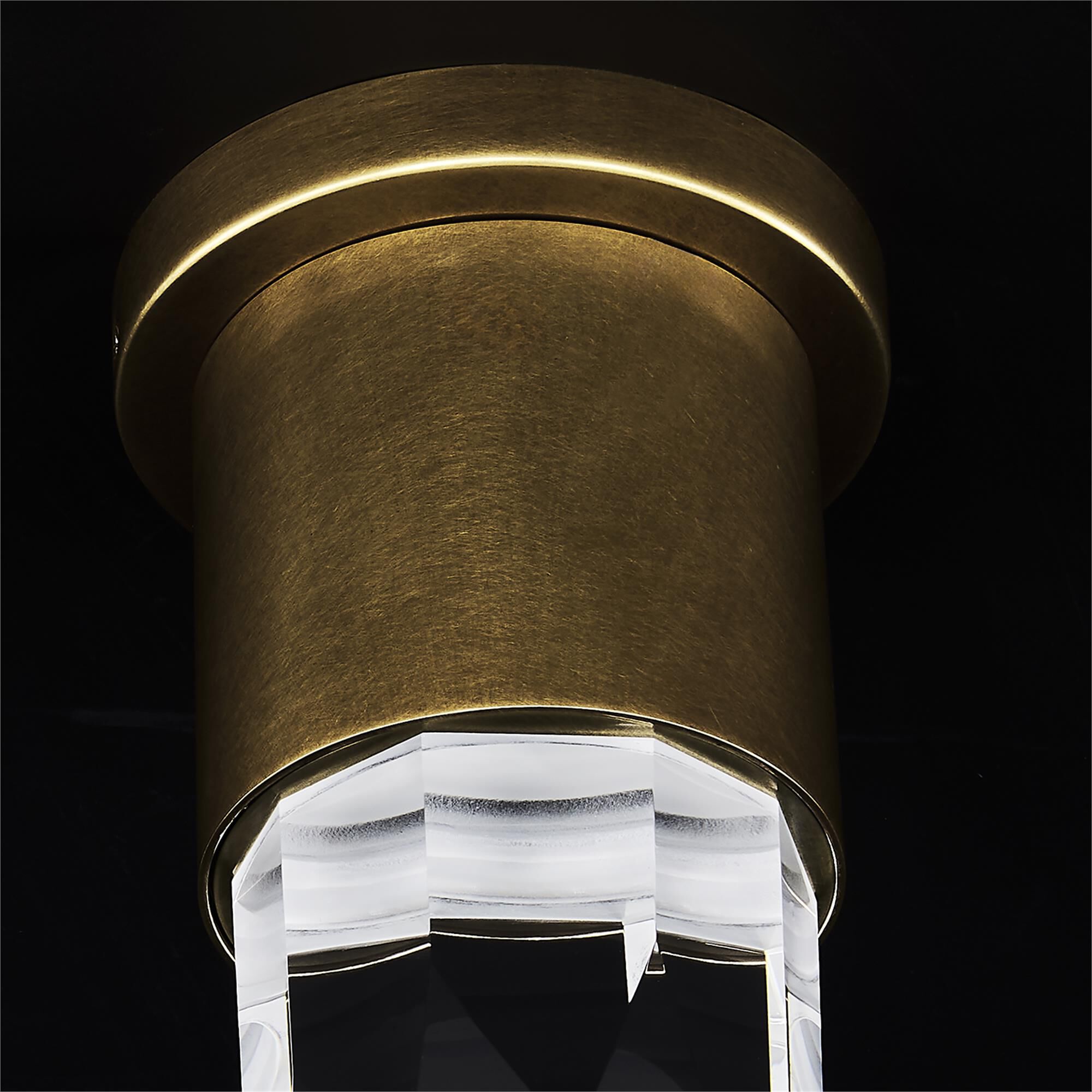 Shown in True Brass finish and Clear crystal
