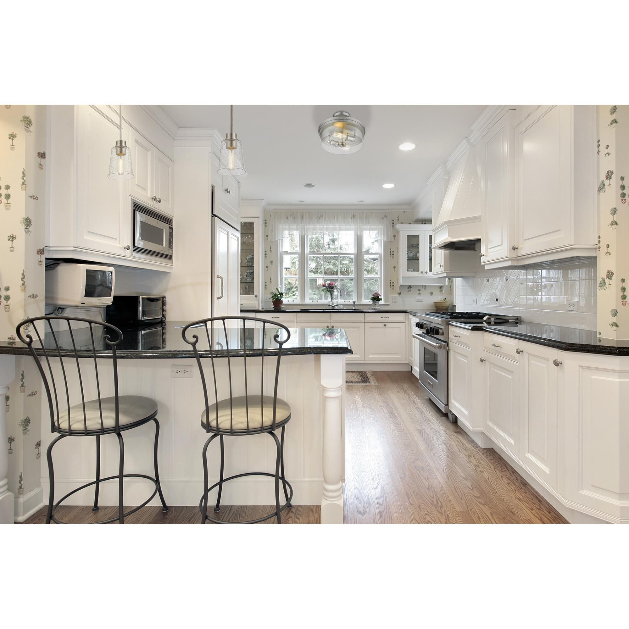 Shown in Brushed Nickel finish and Glass shade