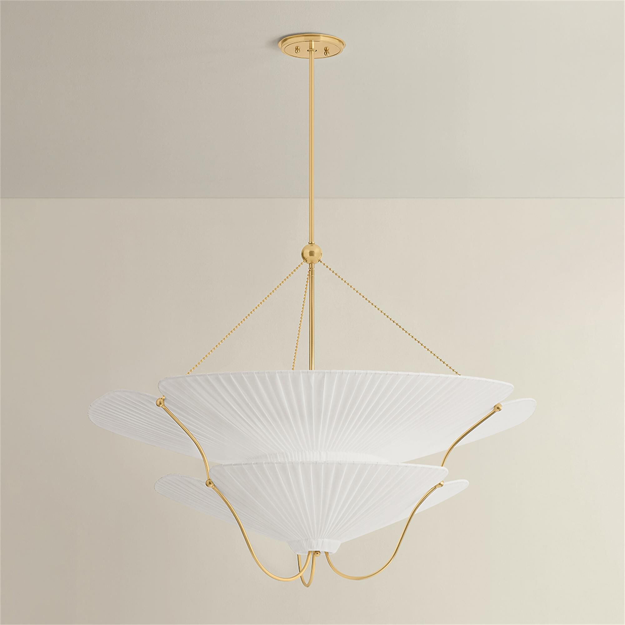 Shown in Aged Brass finish and Ivory Linen shade