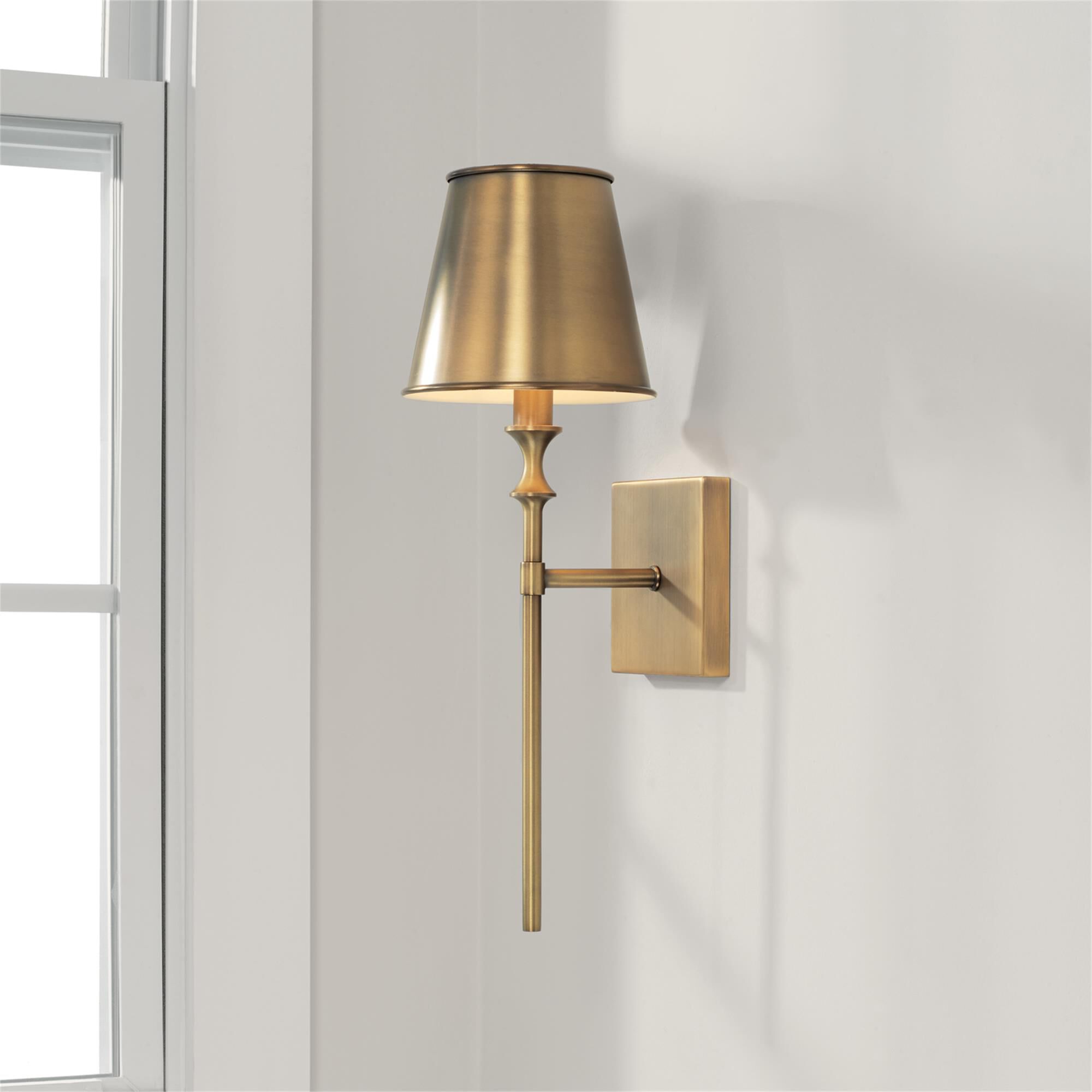 Shown in Aged Brass finish and Aged Brass Metal Stay-Straight  with White Interior shade