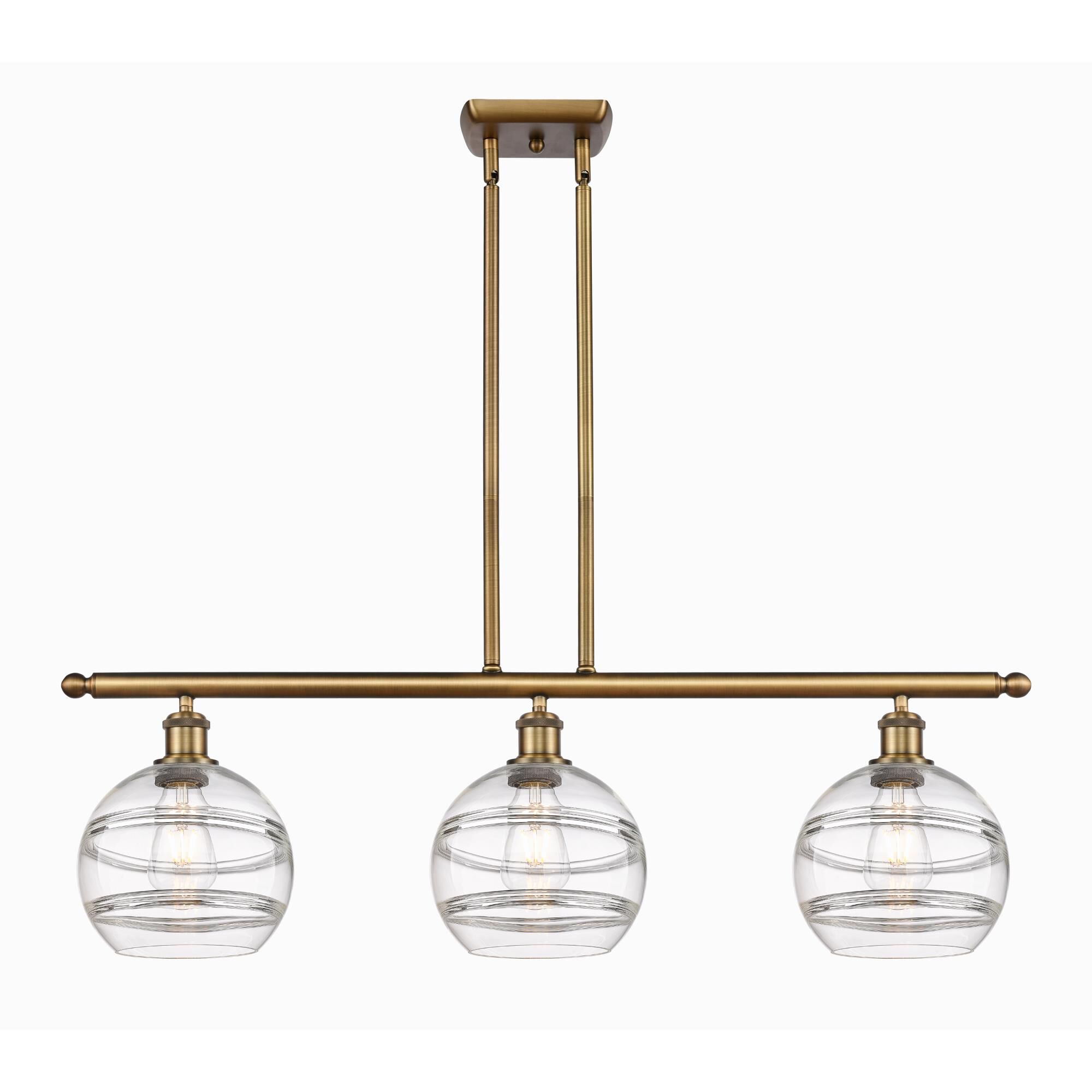 Shown in Brushed Brass finish and Clear glass
