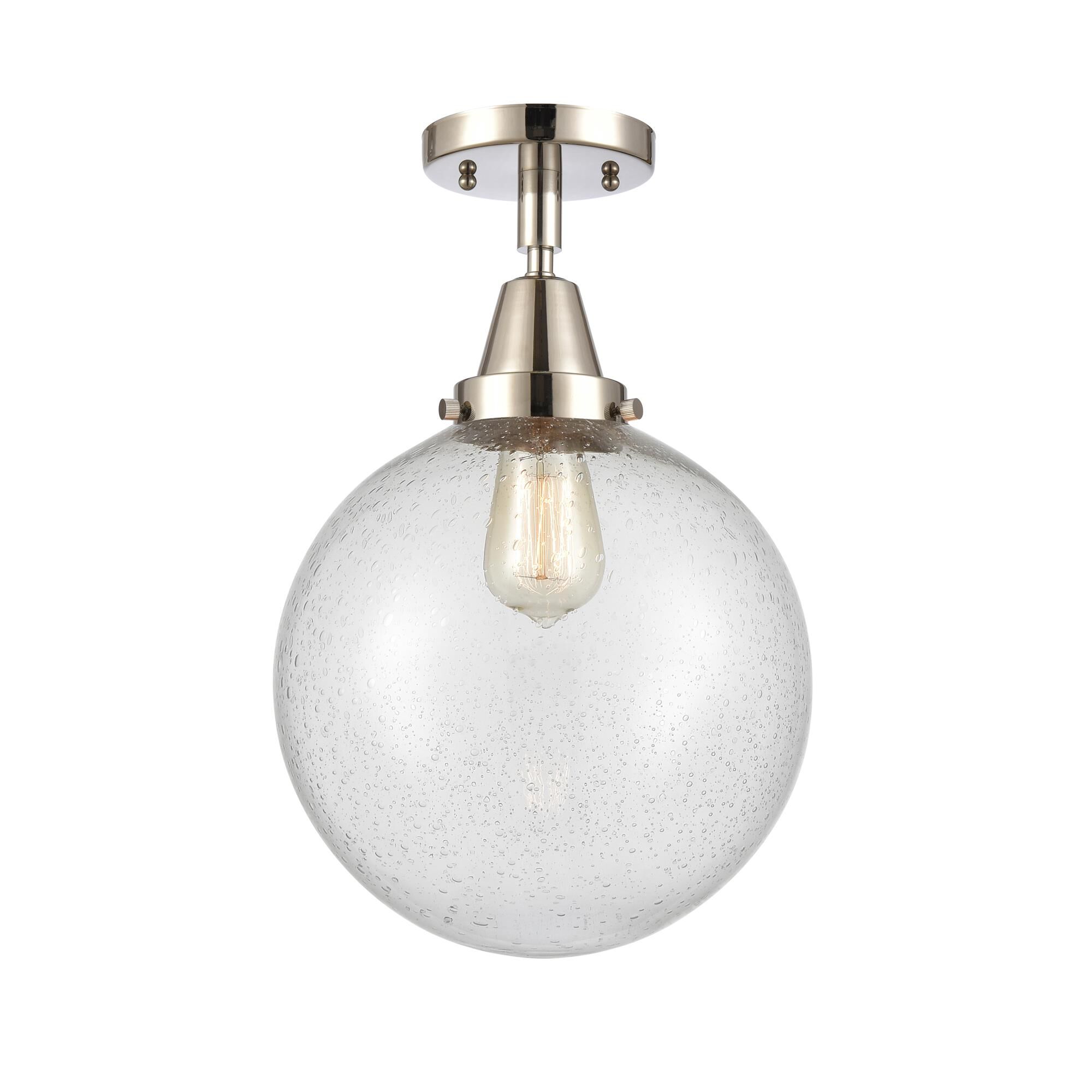Shown in Polished Nickel finish and Seedy Beacon glass