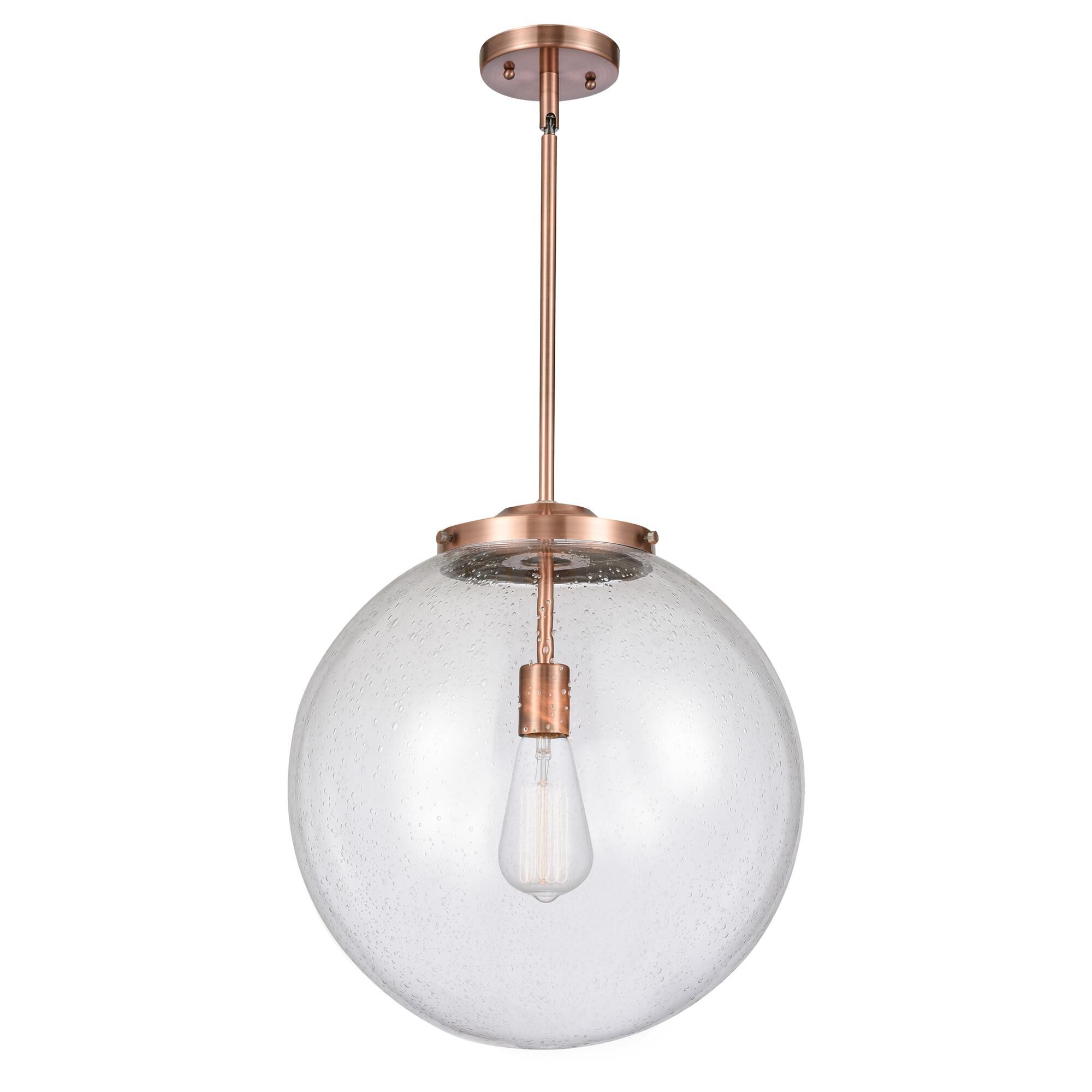 Shown in Antique Copper finish and Seedy Beacon glass