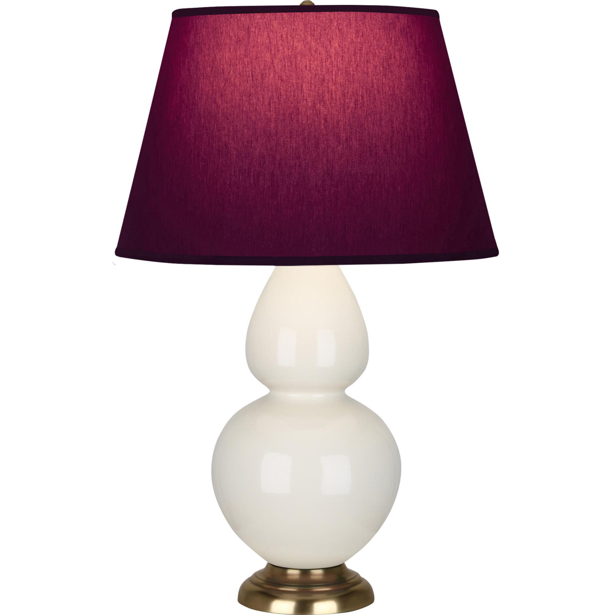 Shown in Bone finish and Plum and Lavender shade and Antique Natural Brass accent
