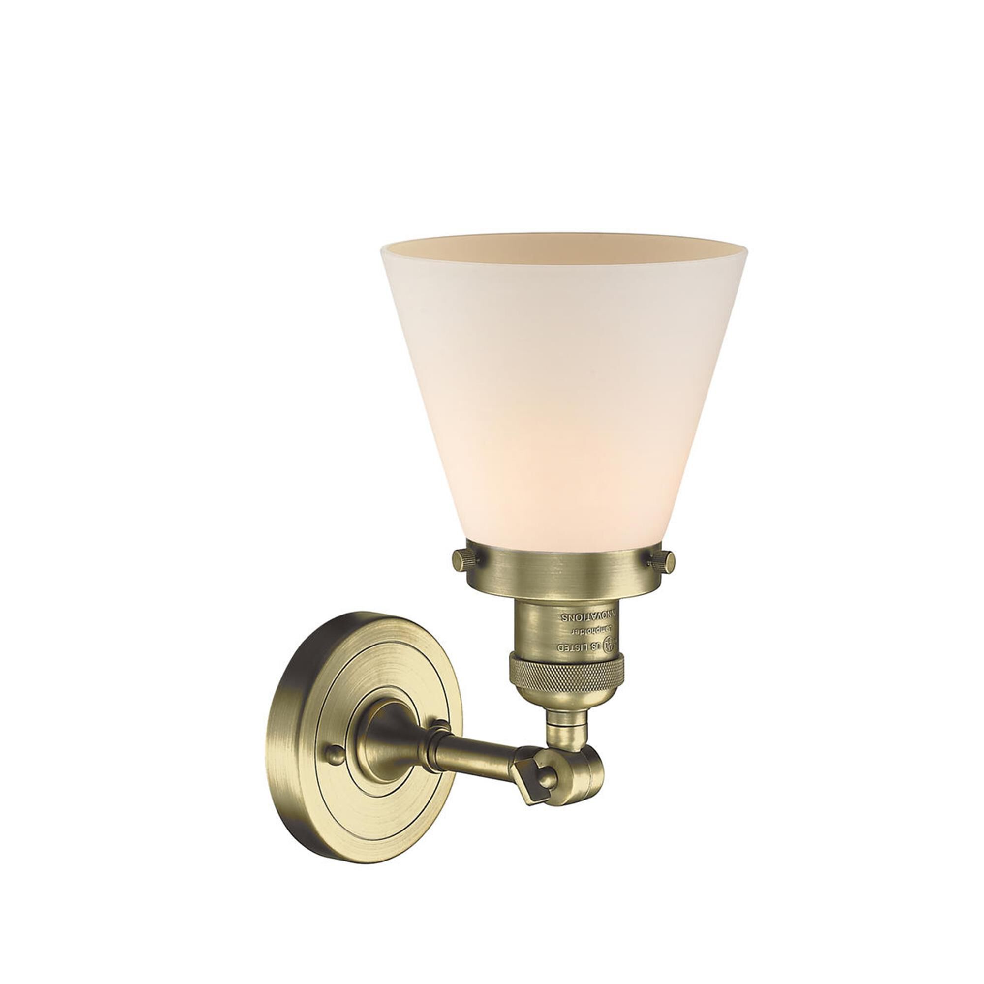 Shown in Antique Brass finish and Matte White Cased glass