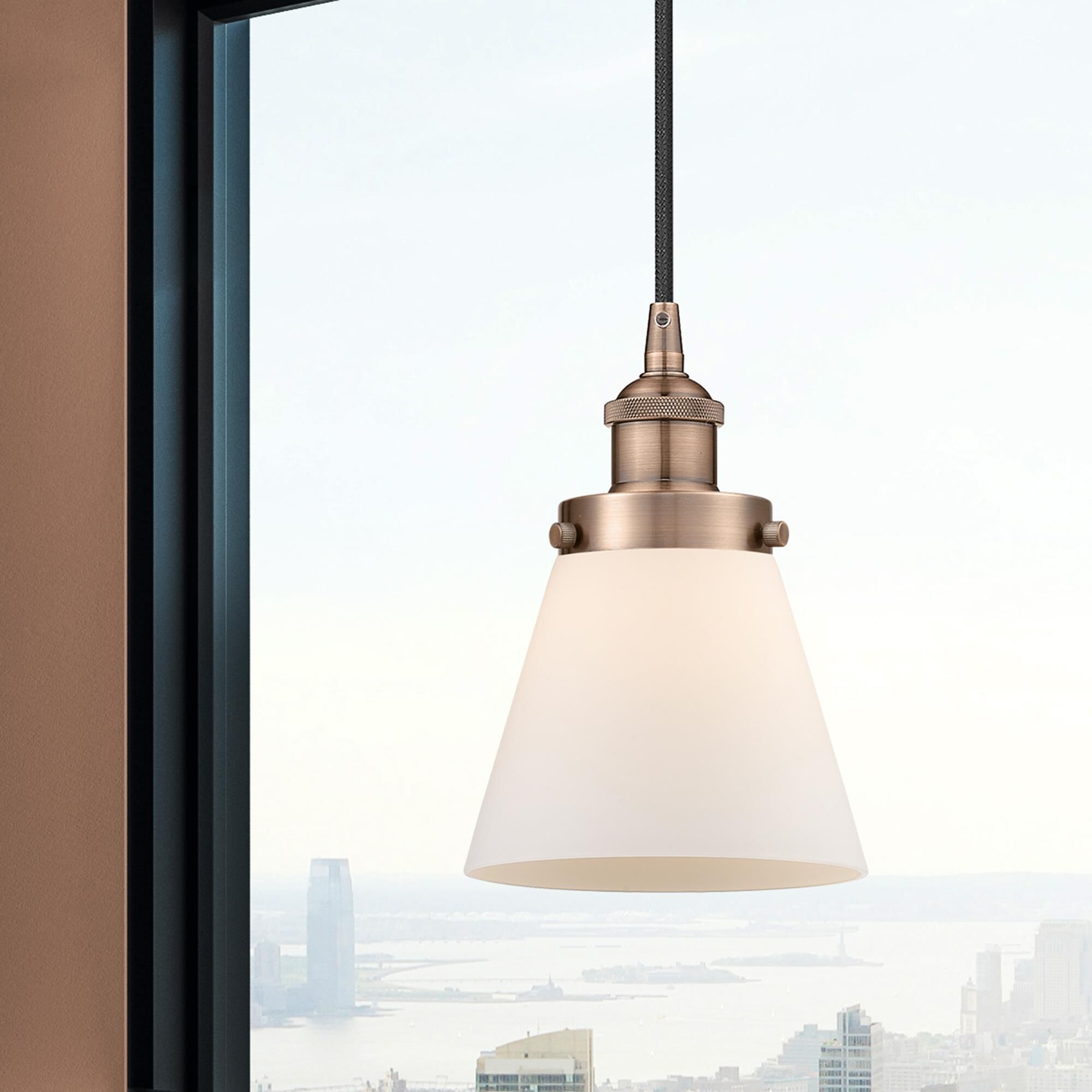 Shown in Antique Copper finish and Matte White Cased Small Cone glass