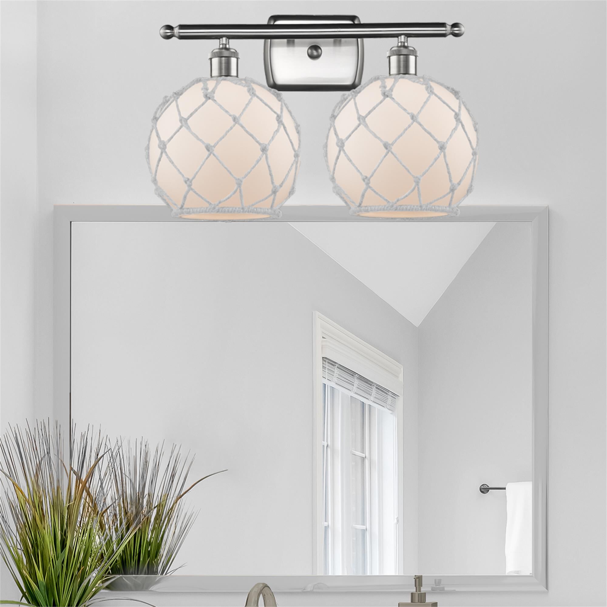 Shown in Brushed Satin Nickel finish and White glass and White Rope accent