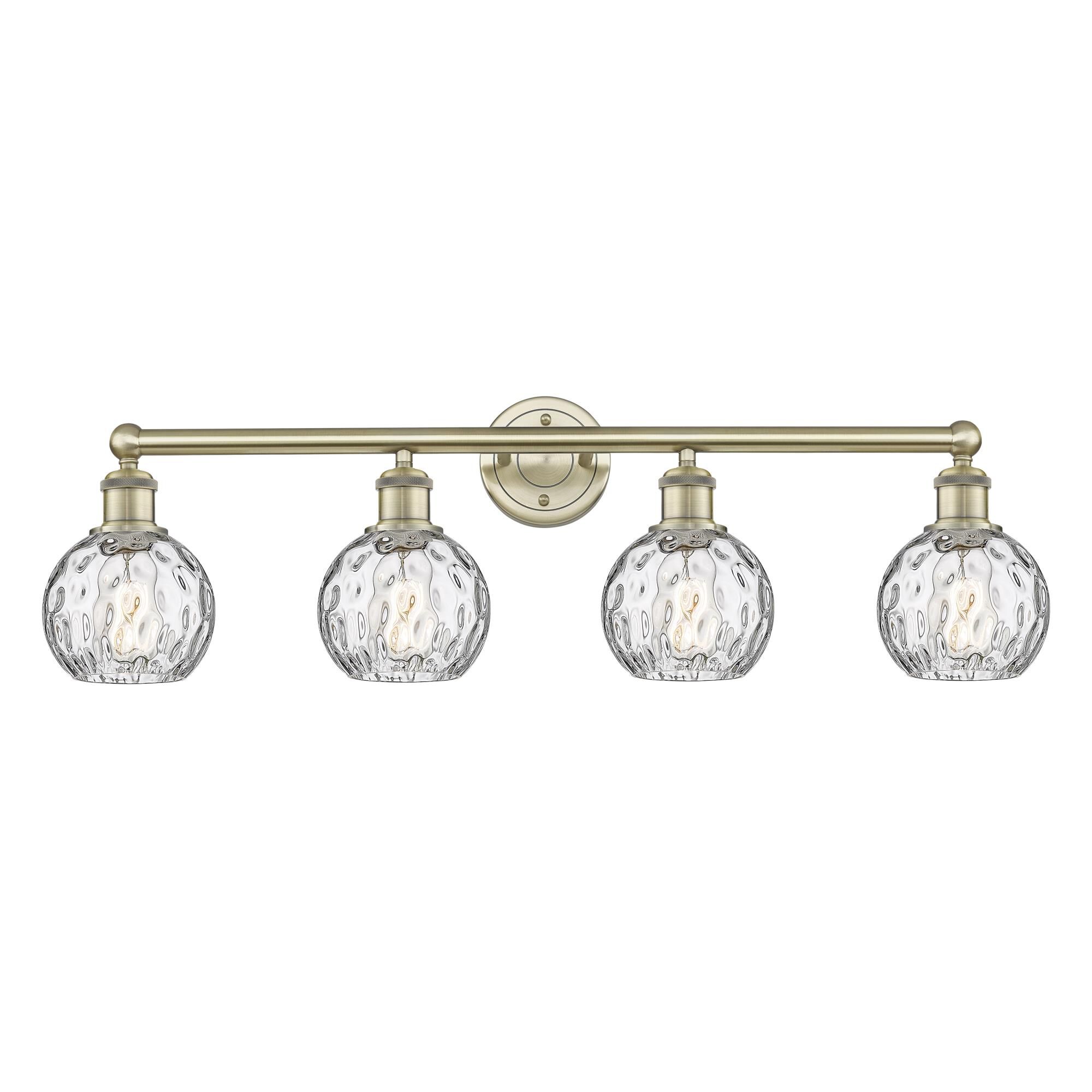 Shown in Antique Brass finish and Clear Water Glass glass