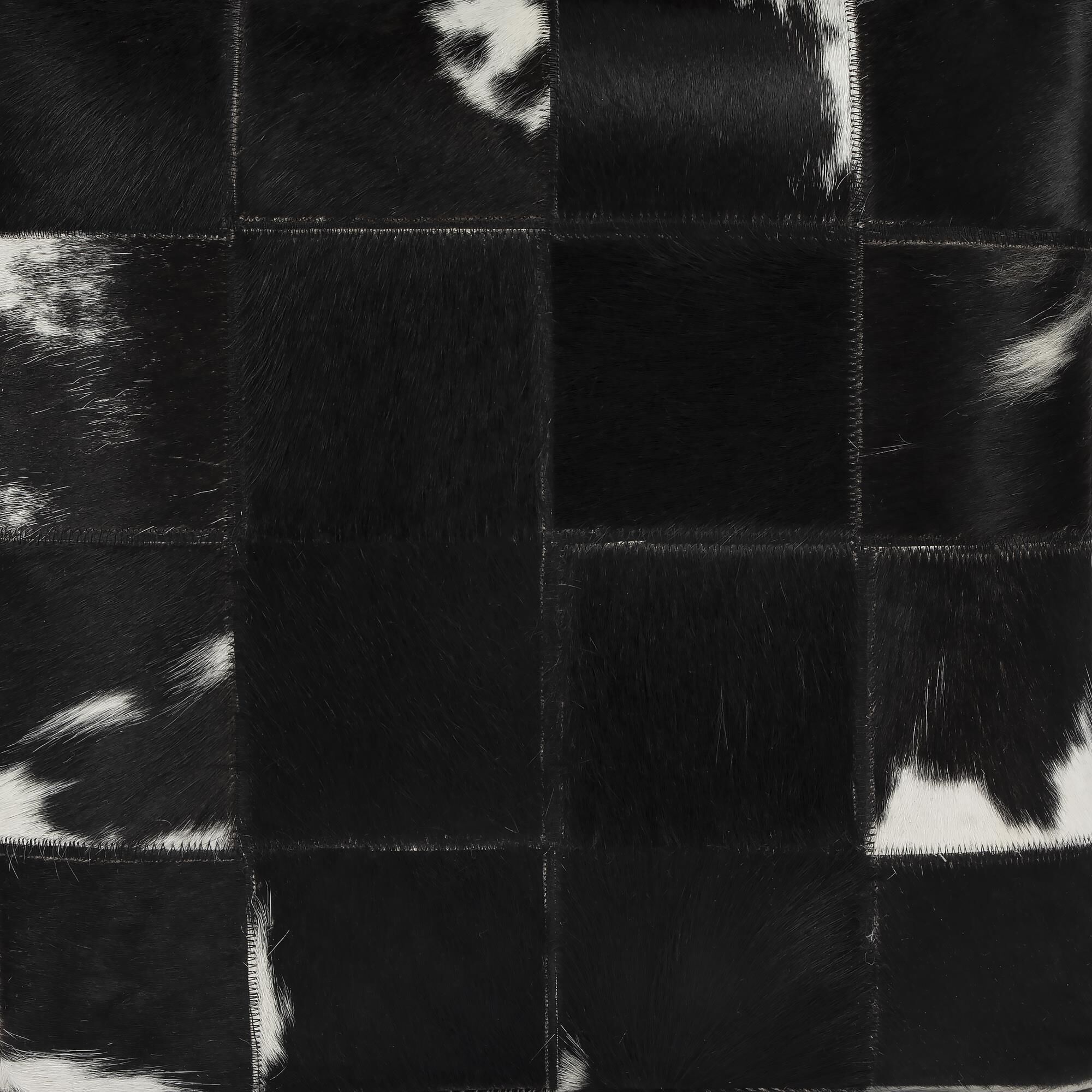 Shown in Hair on Hide finish