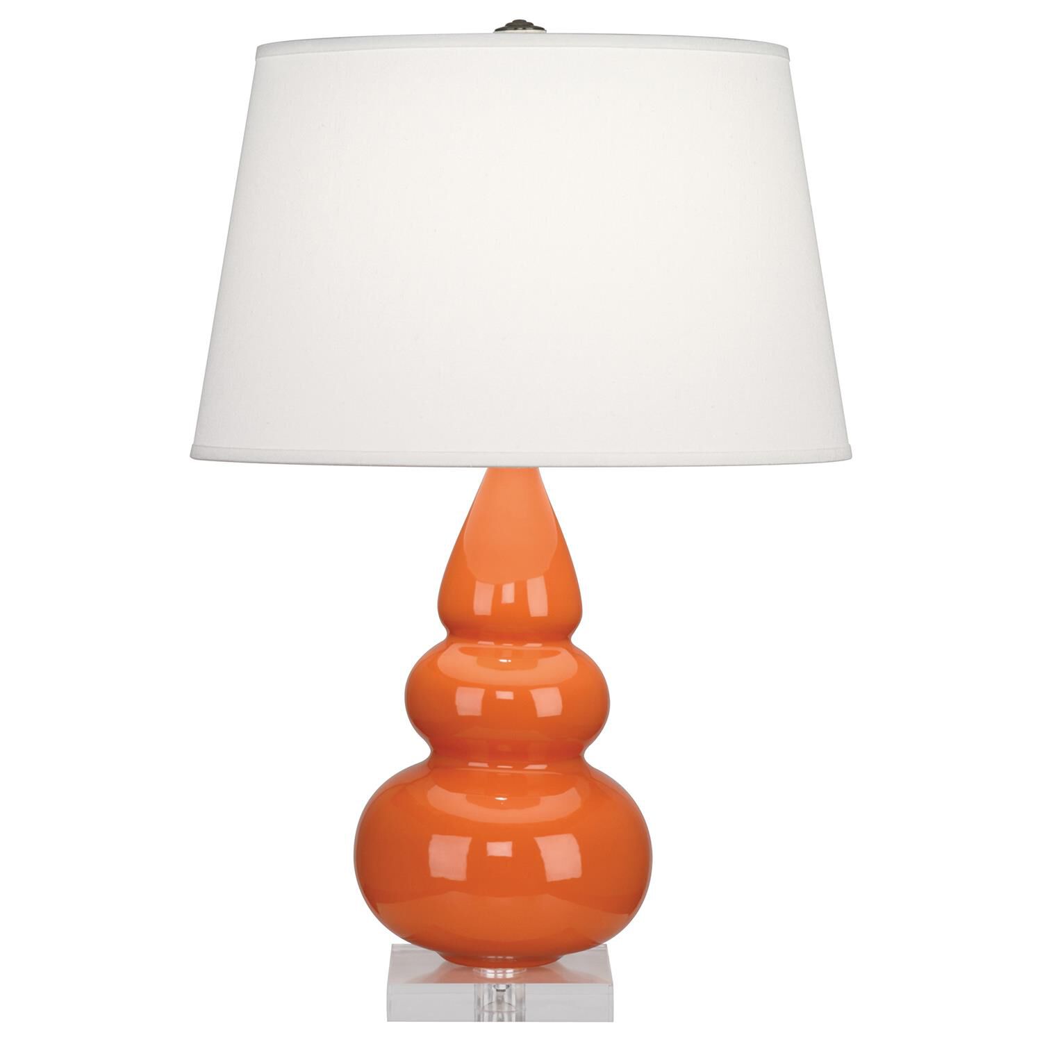 Shown in Pumpkin Glazed Ceramic With Lucite Base finish and Pearl Dupioni Fabric shade