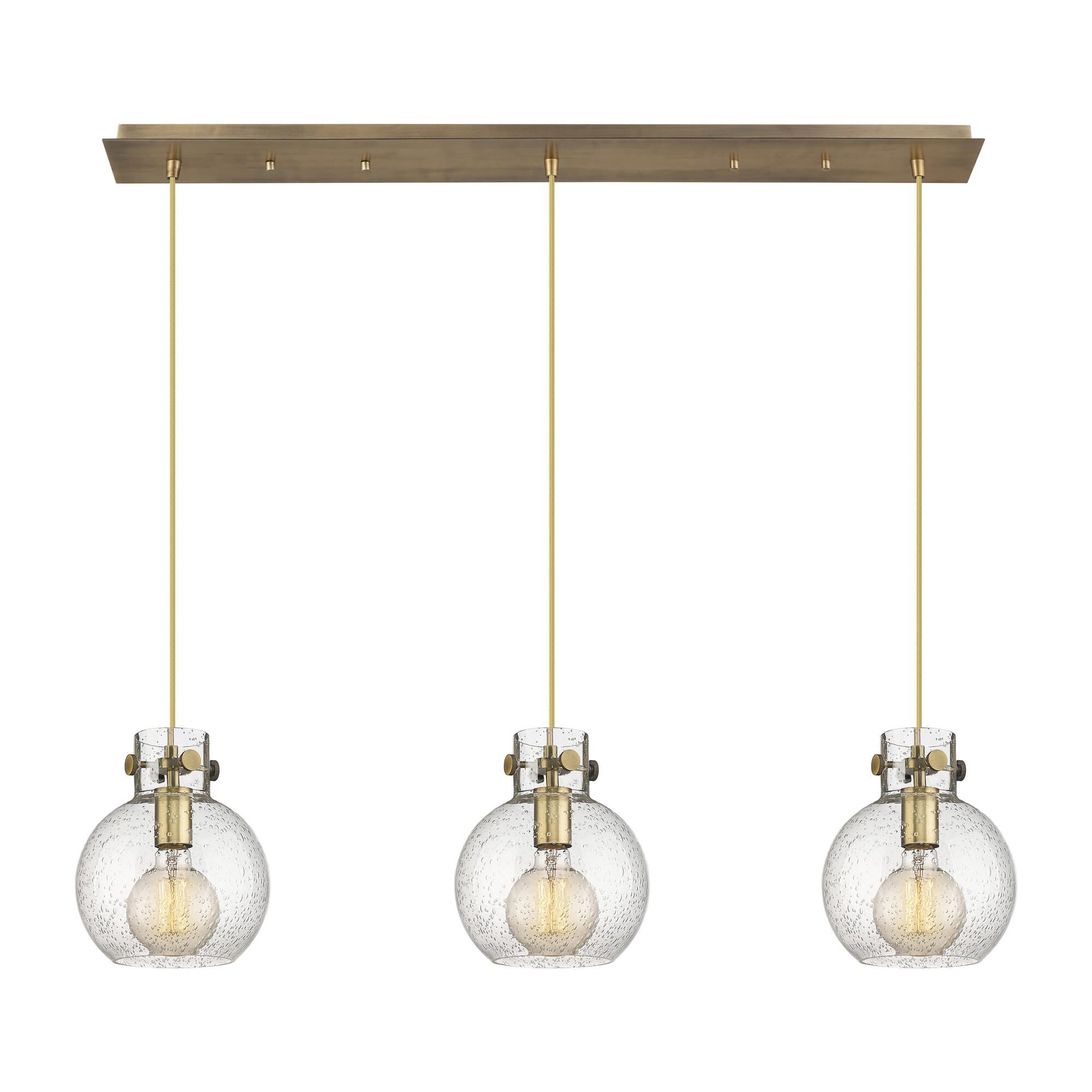 Shown in Brushed Brass finish and Seedy glass and Seedy Glass shade