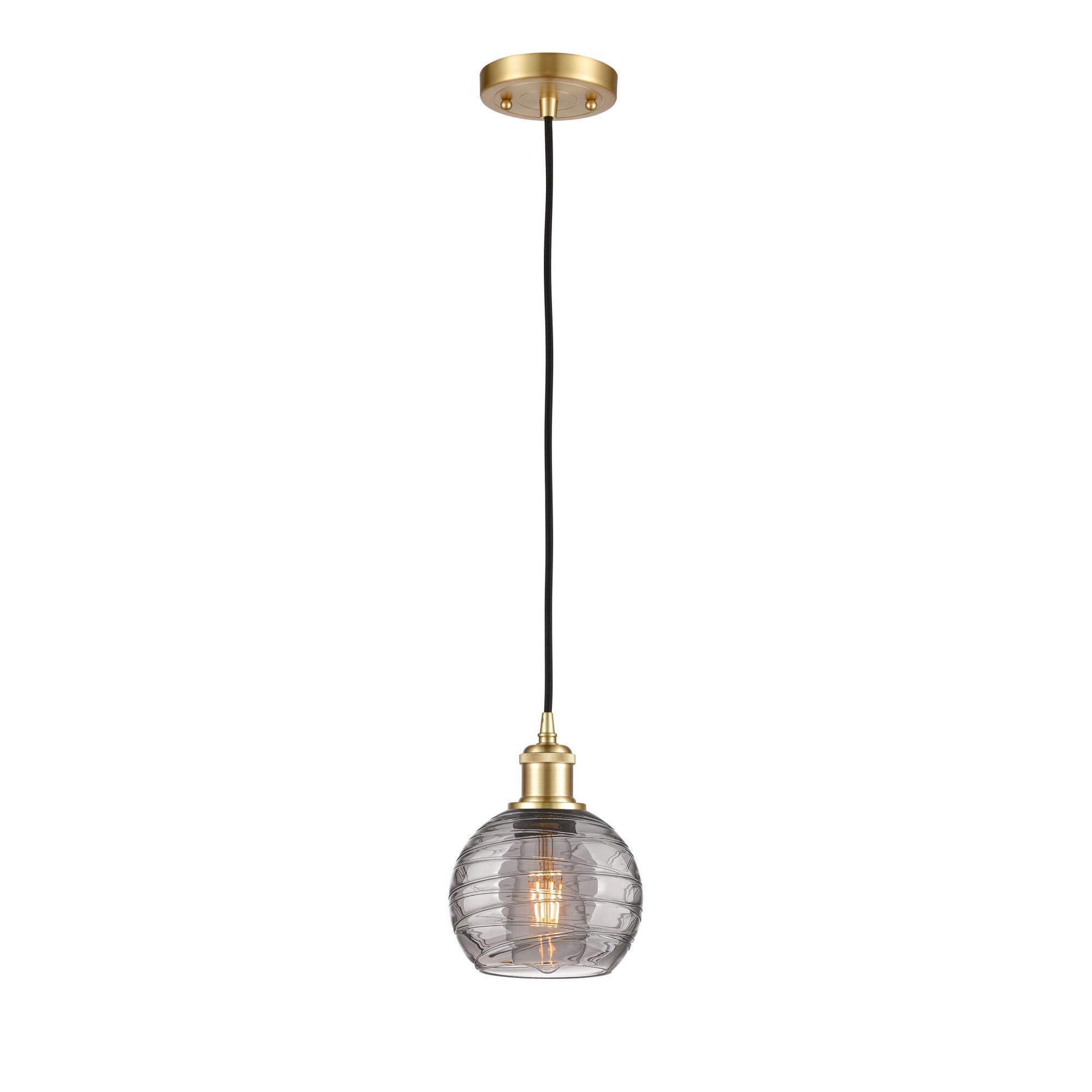 Shown in Satin Gold finish and Light Smoke Deco Swirl glass