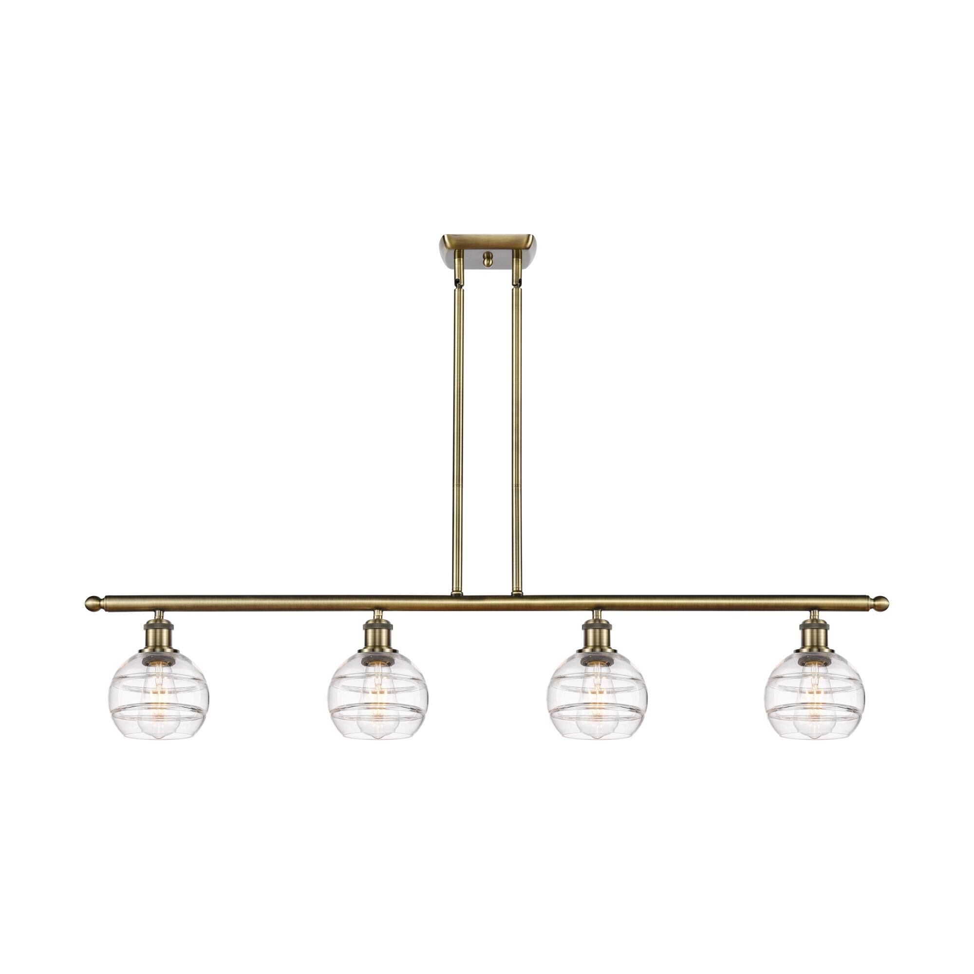 Shown in Antique Brass finish and Clear glass