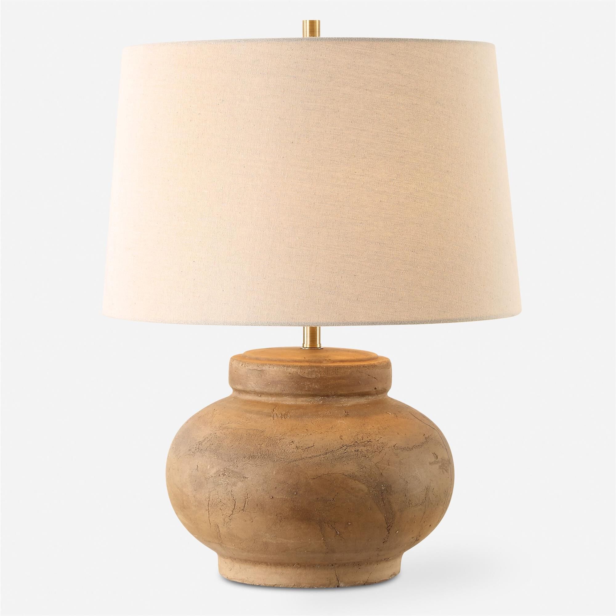 Shown in Crafted With A Distressed Terracotta Base, The Urbino Table Lamp Exudes Warmth And Character With It finish and Round Hardback  Rolled Edge shade