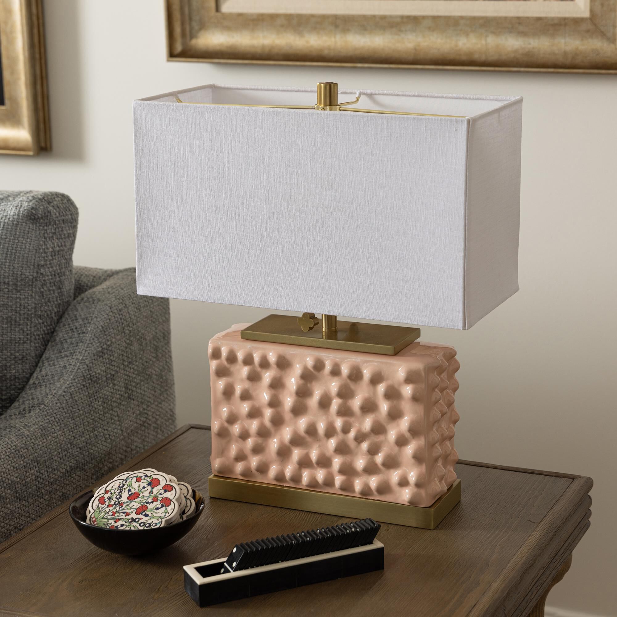 Shown in Pearl Blush and Polished Brass finish and Off-White shade
